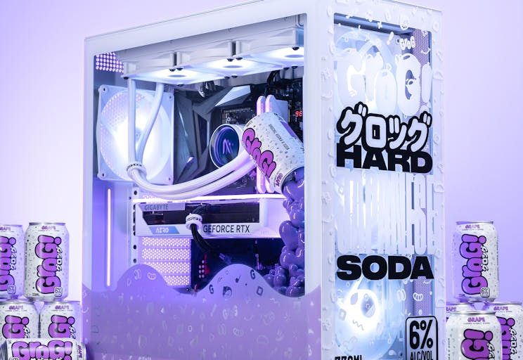 Aftershock Ultra-Labs team delivering a bespoke PC to a satisfied customer.