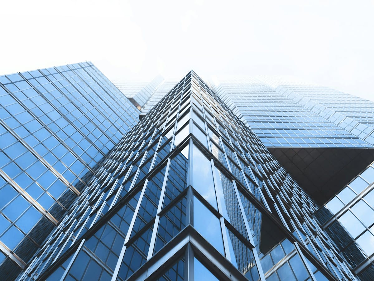 Photo of glass skyscrapers from below