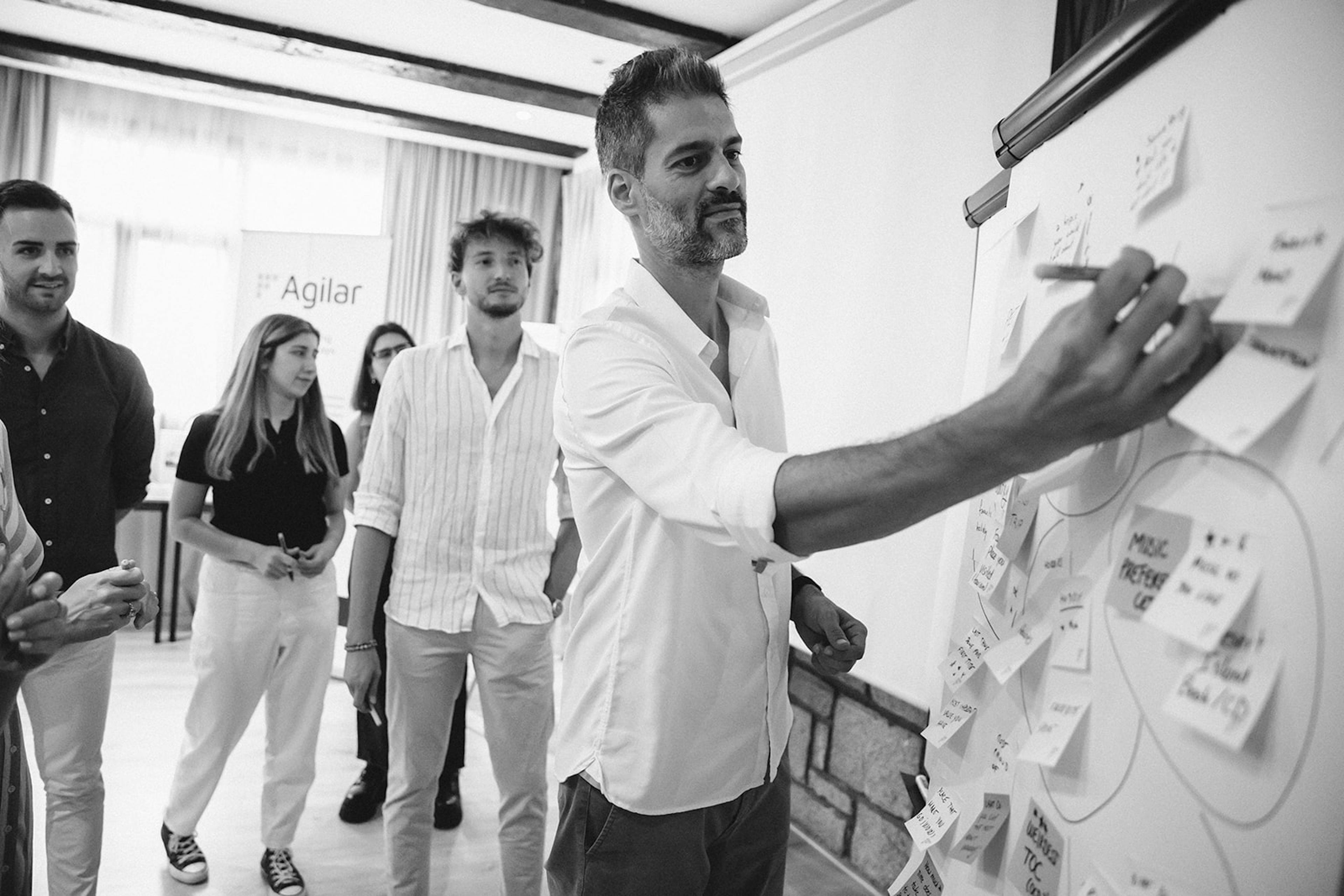 A team writing on a board
