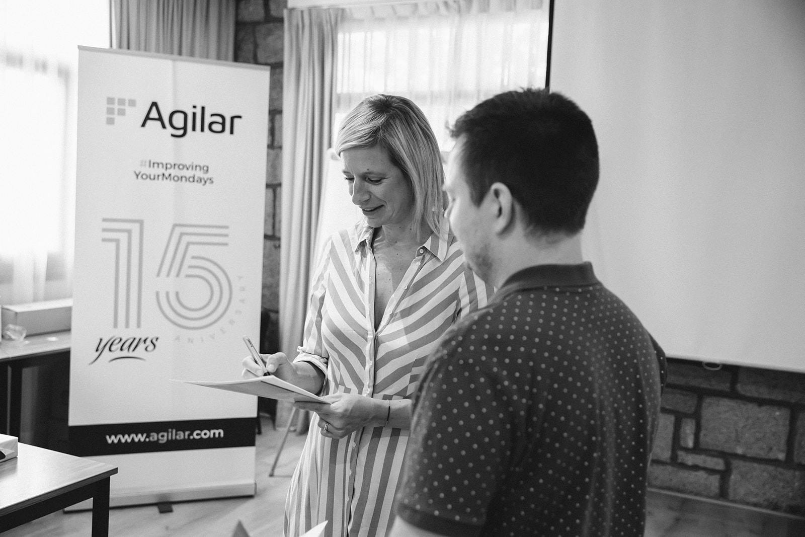Two colleagues working and assessing