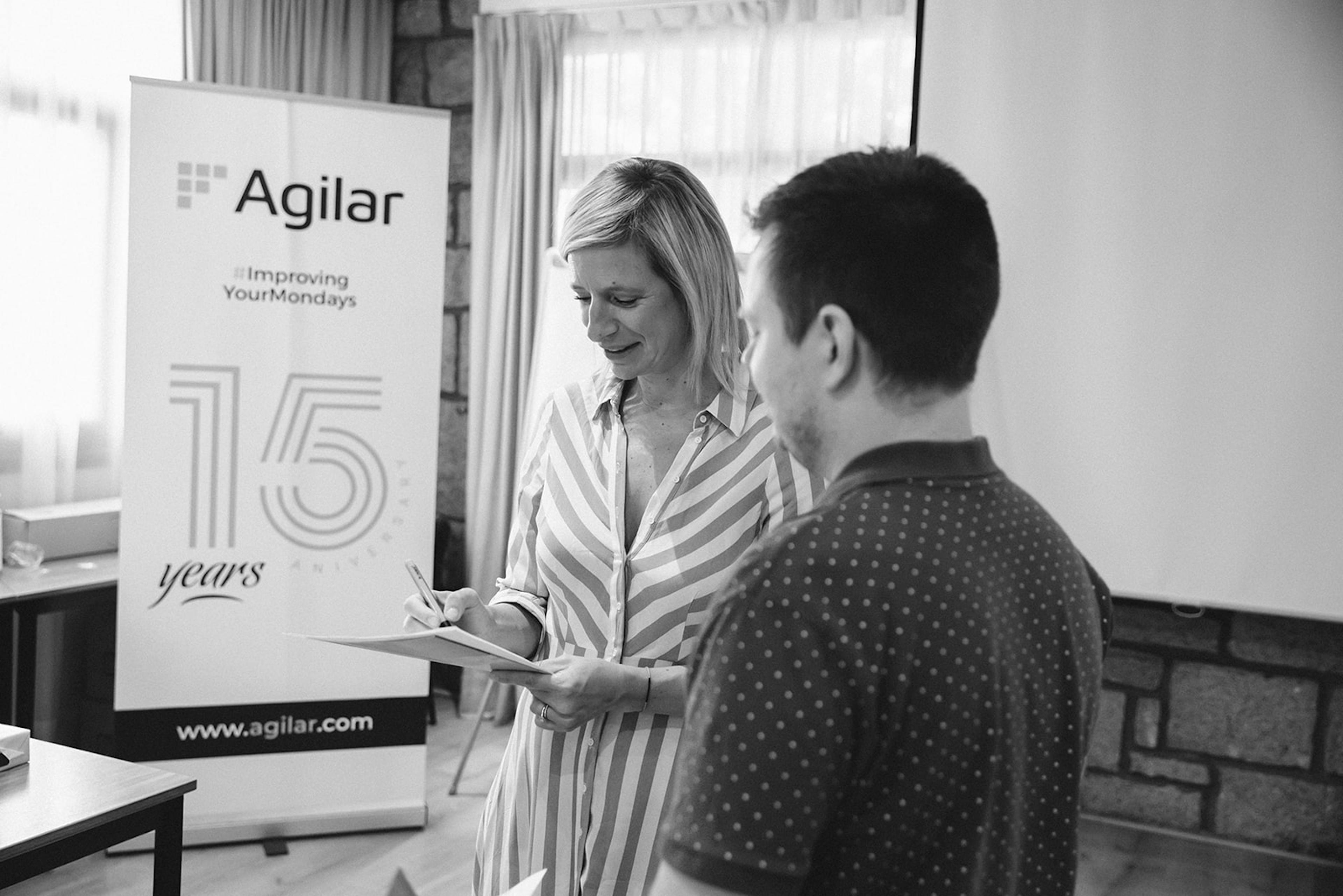 Two colleagues working and assessing