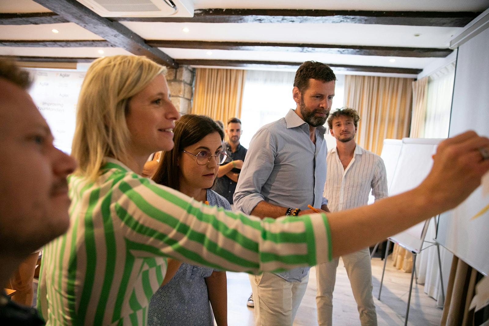 A team working on a board