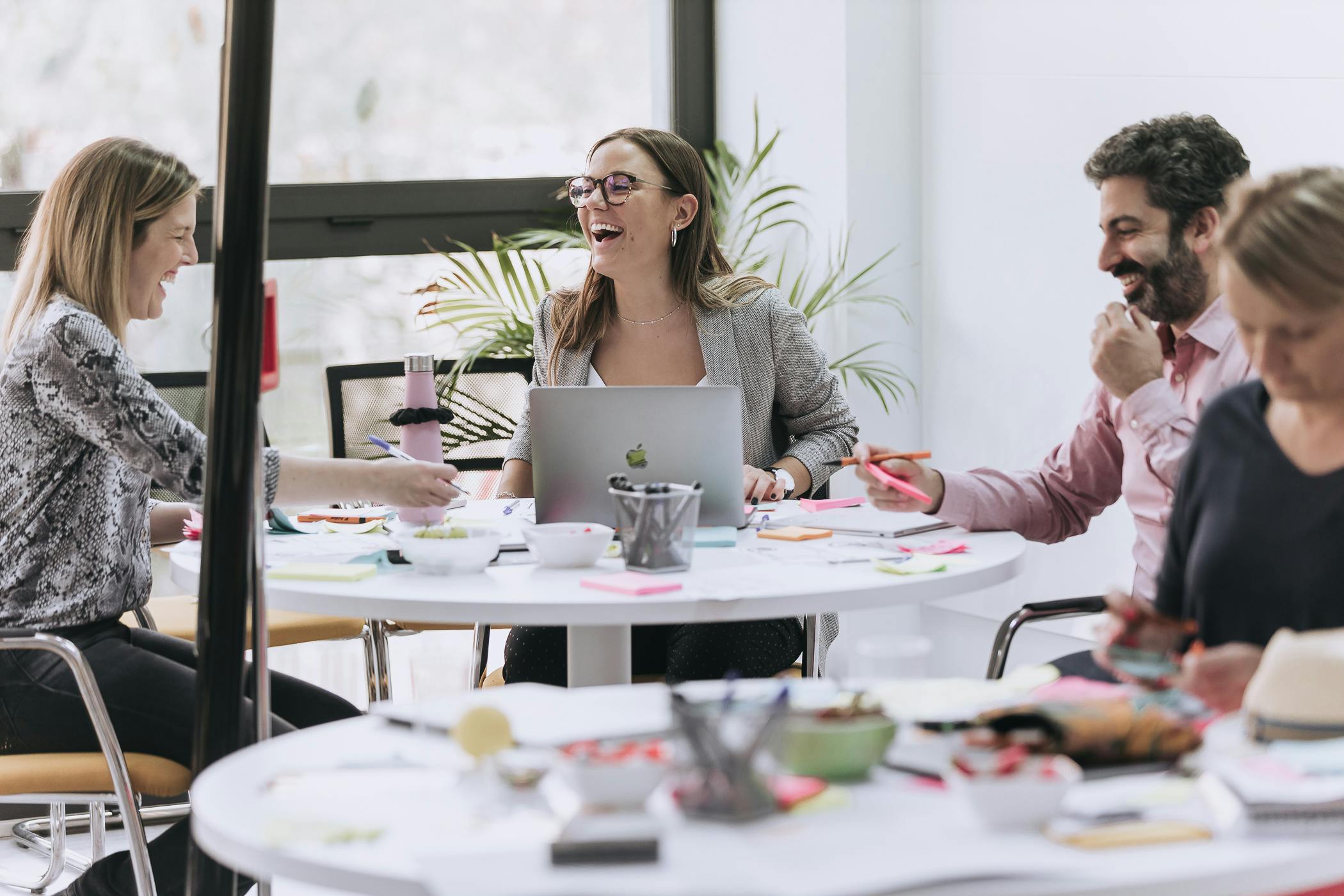 people working and collaborating around a table