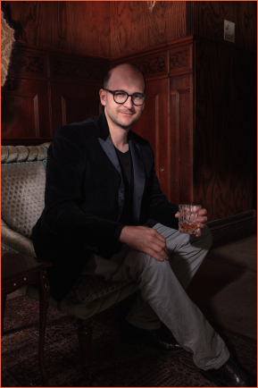 Daniel Szabo, CEO of Koerber Digital and Founder of AI Propos, sitting down. 