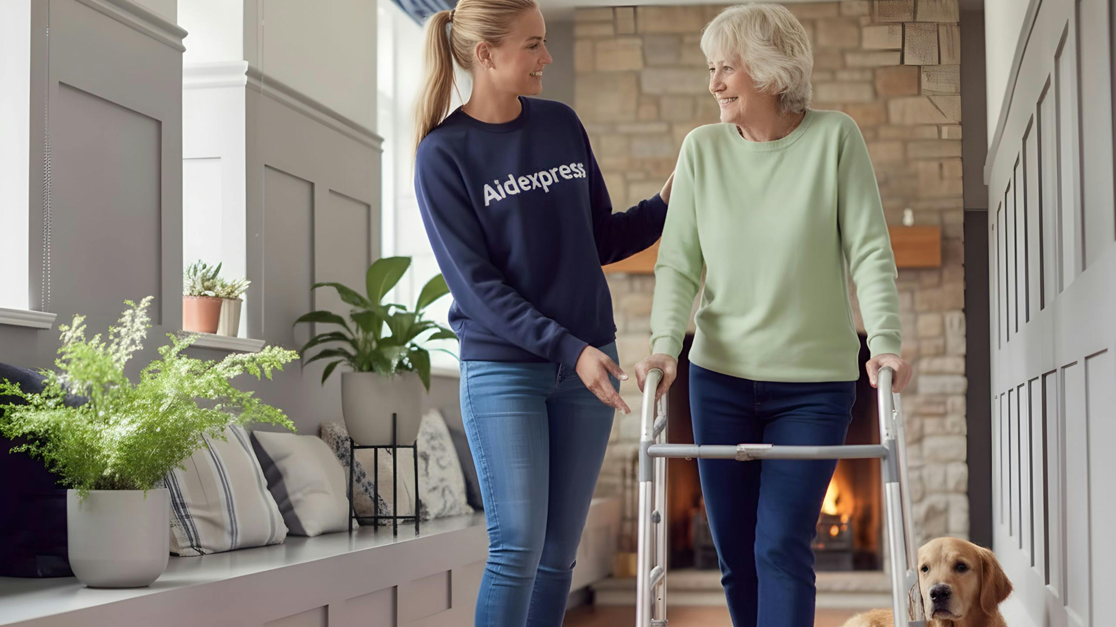 Ergothérapeute à domicile Aidexpress aide une femme à marcher avec son déambulateur, illustrant l’adaptation fonctionnelle et le soutien à l’autonomie des aînés.