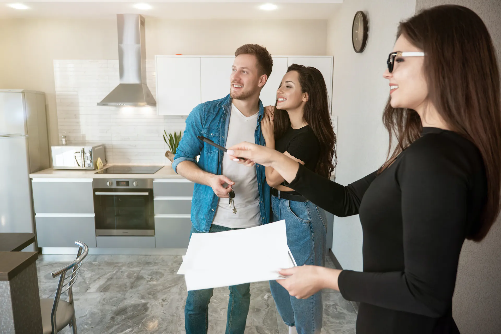 Young property manager showing vacation rental apartment.
