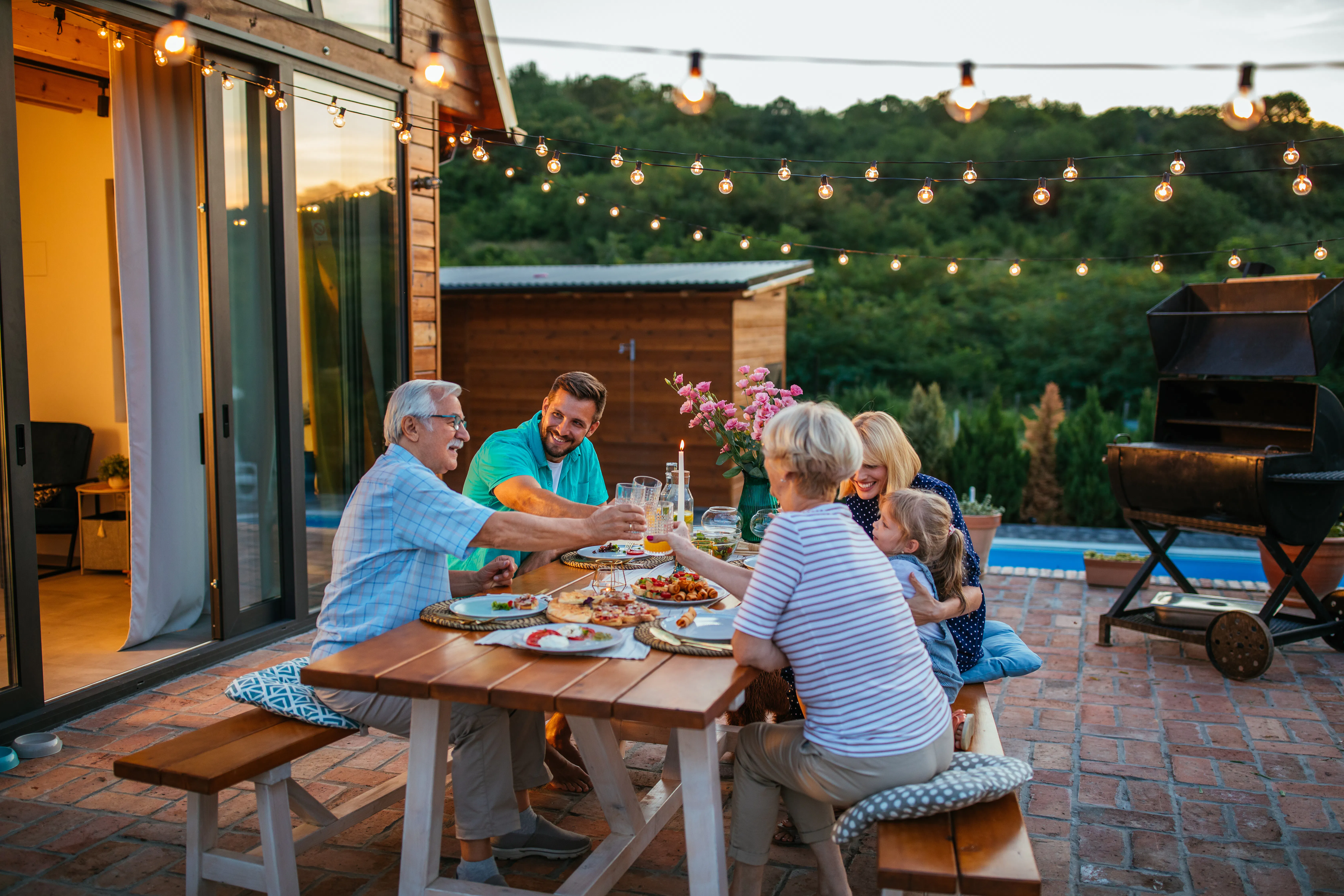 Family eating on back patio