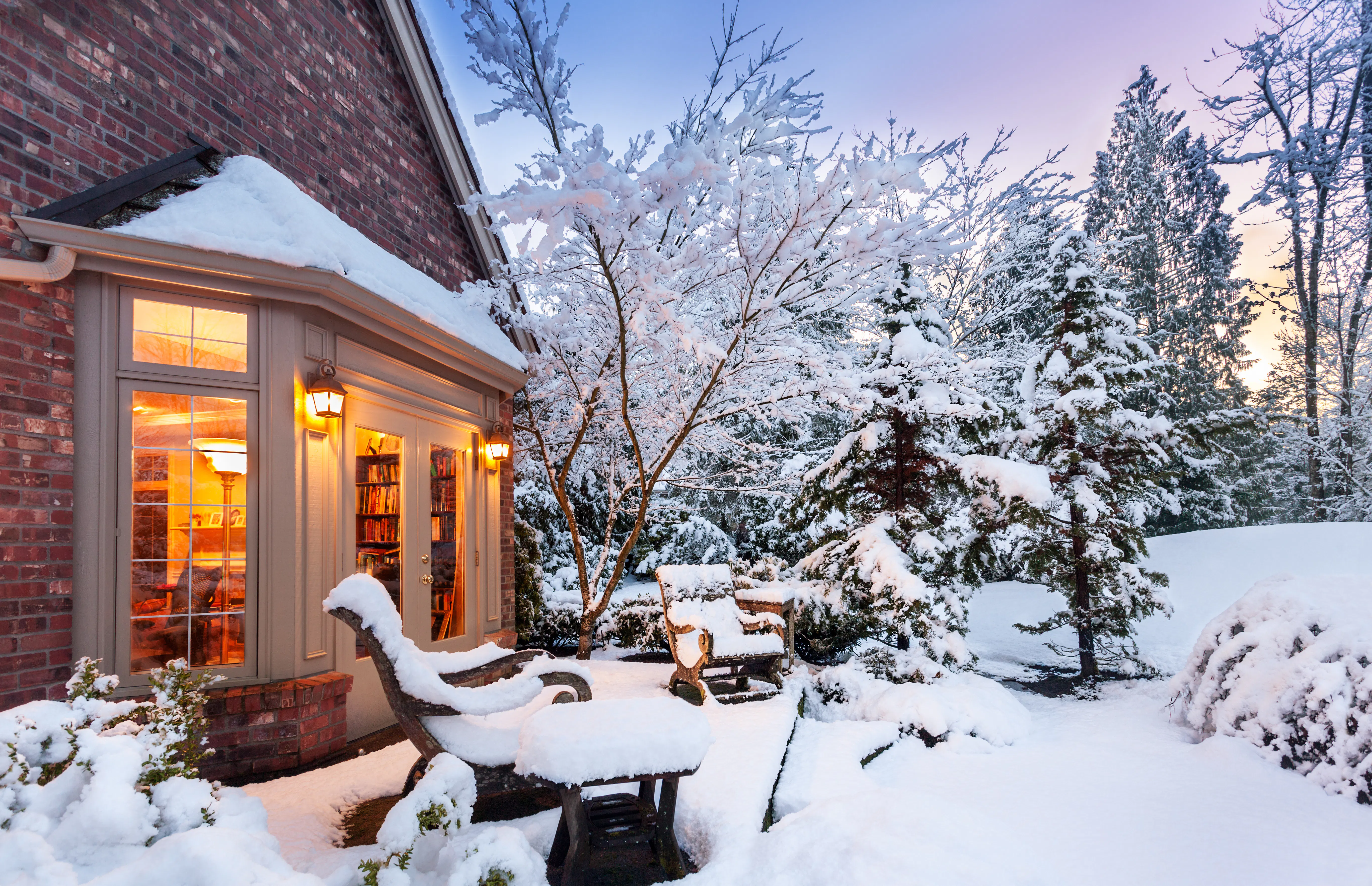 Wintry home at sunset