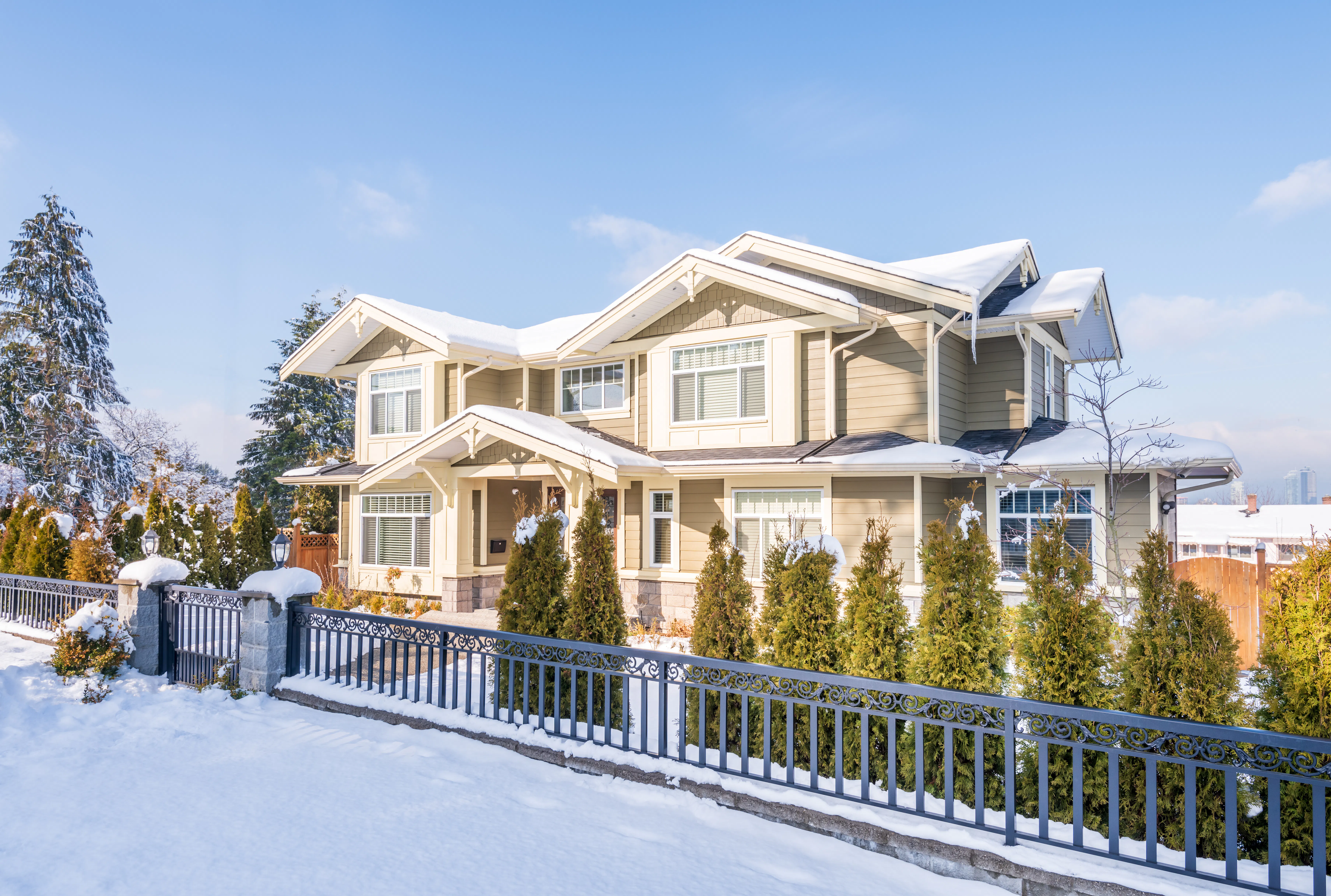 A typical american house in winter. Snow covered