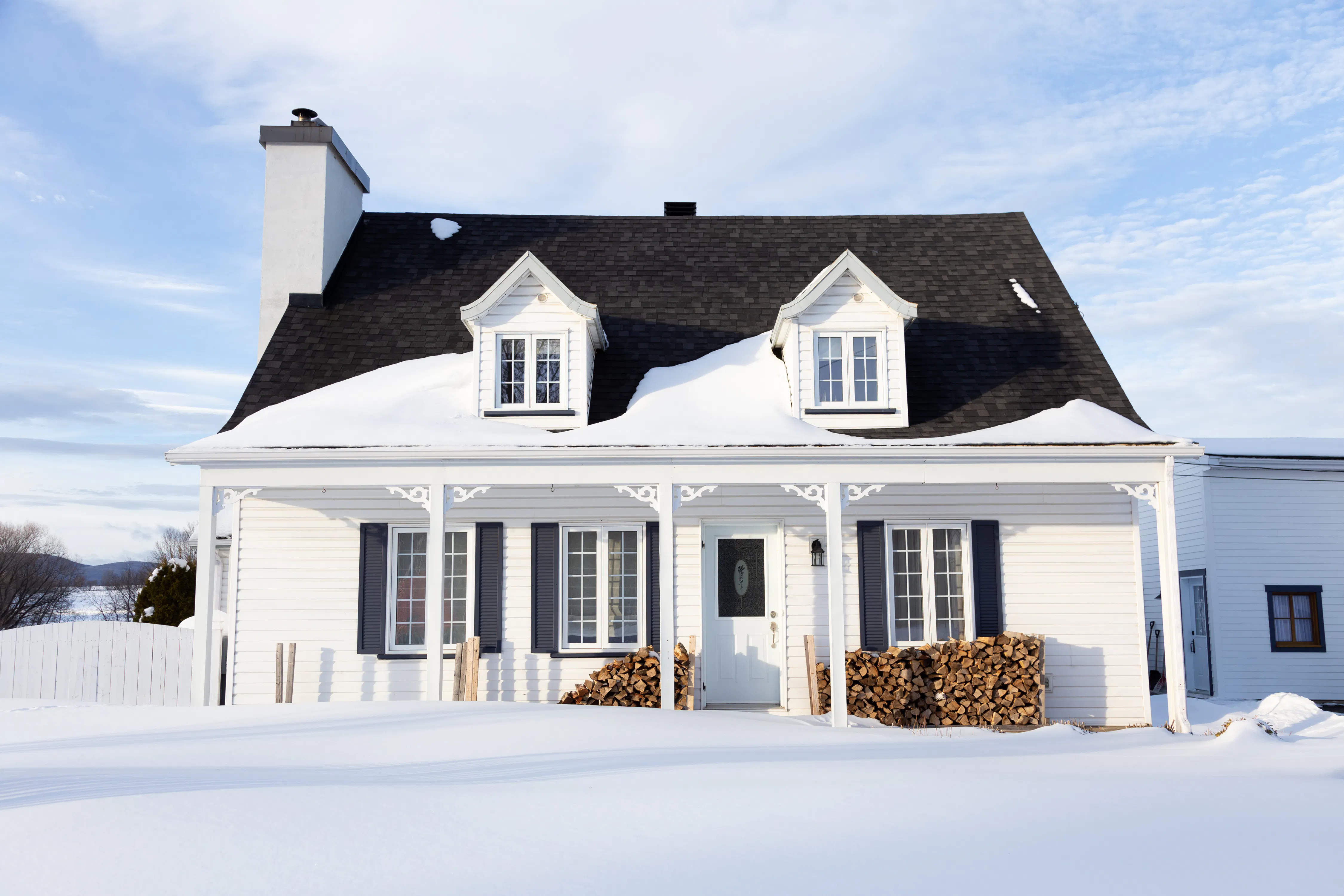 Beautiful patrimonial white French-style clapboard house with dormer windows