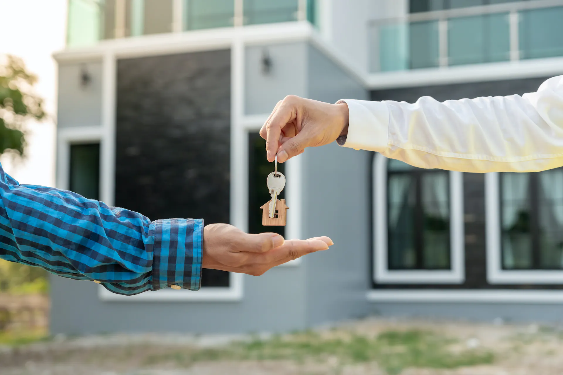 Property manager handing over the keys to a vacation rental.