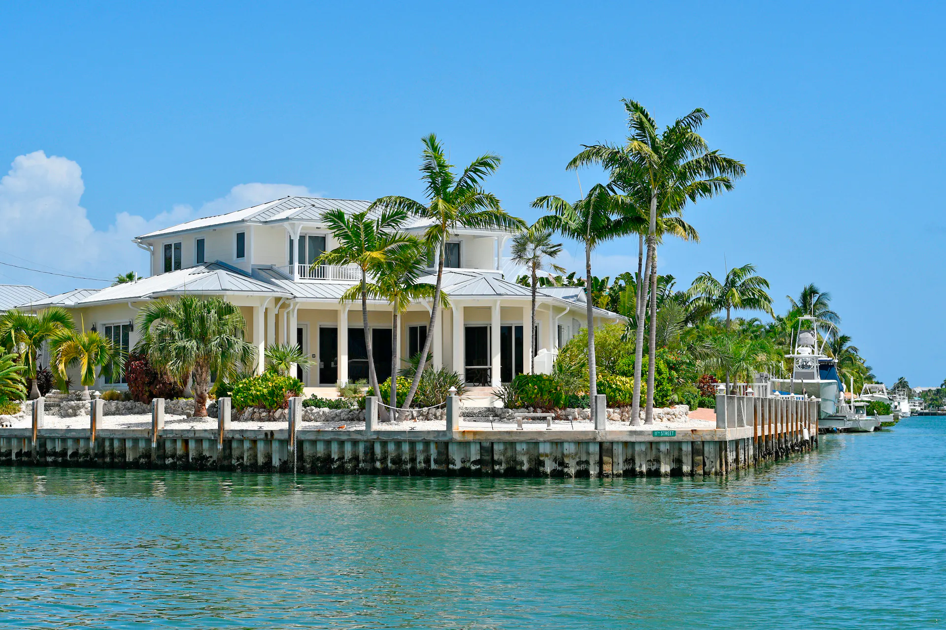 Waterfront homes and boats along the canal in the Florida Keys.