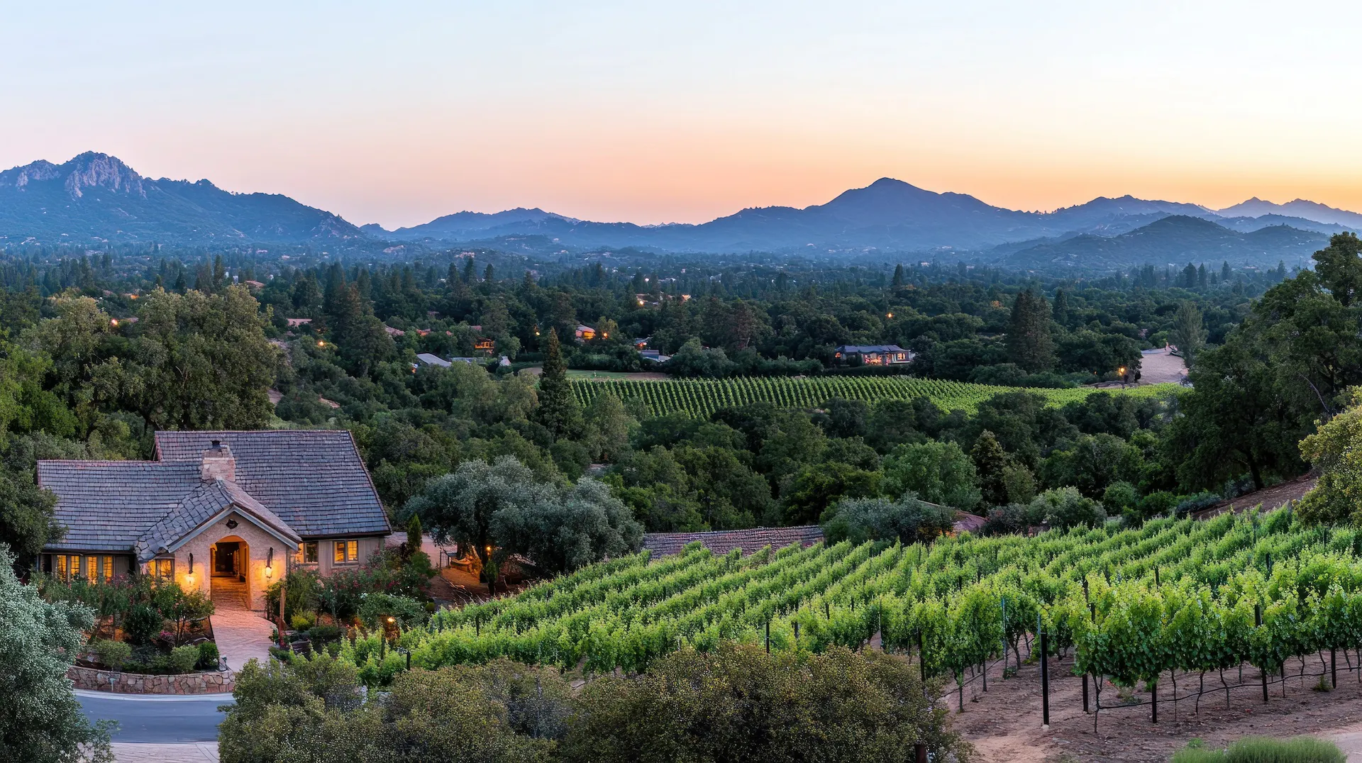 Serene Sunset over Napa Valley Vineyard and Mountain Range.