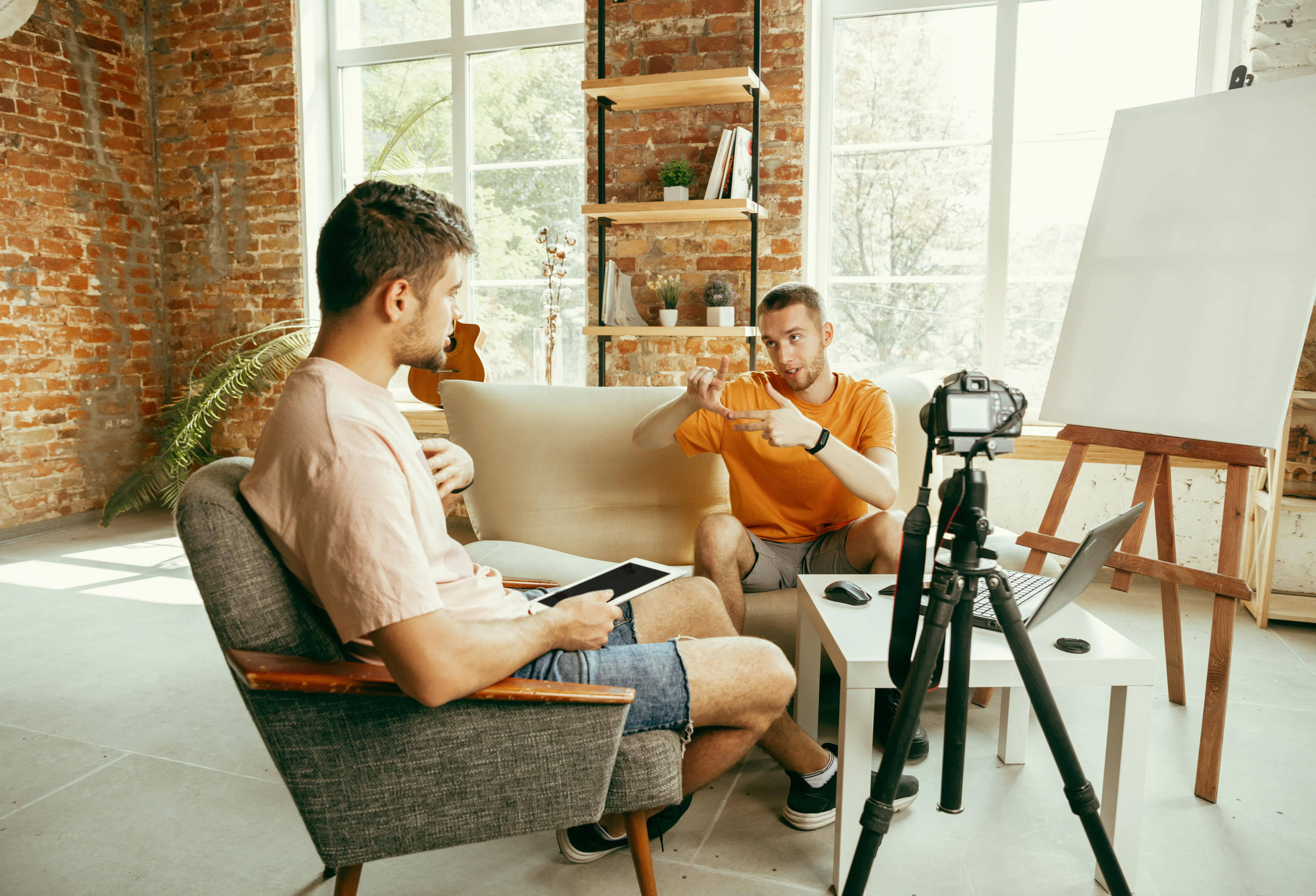 two men with tripod