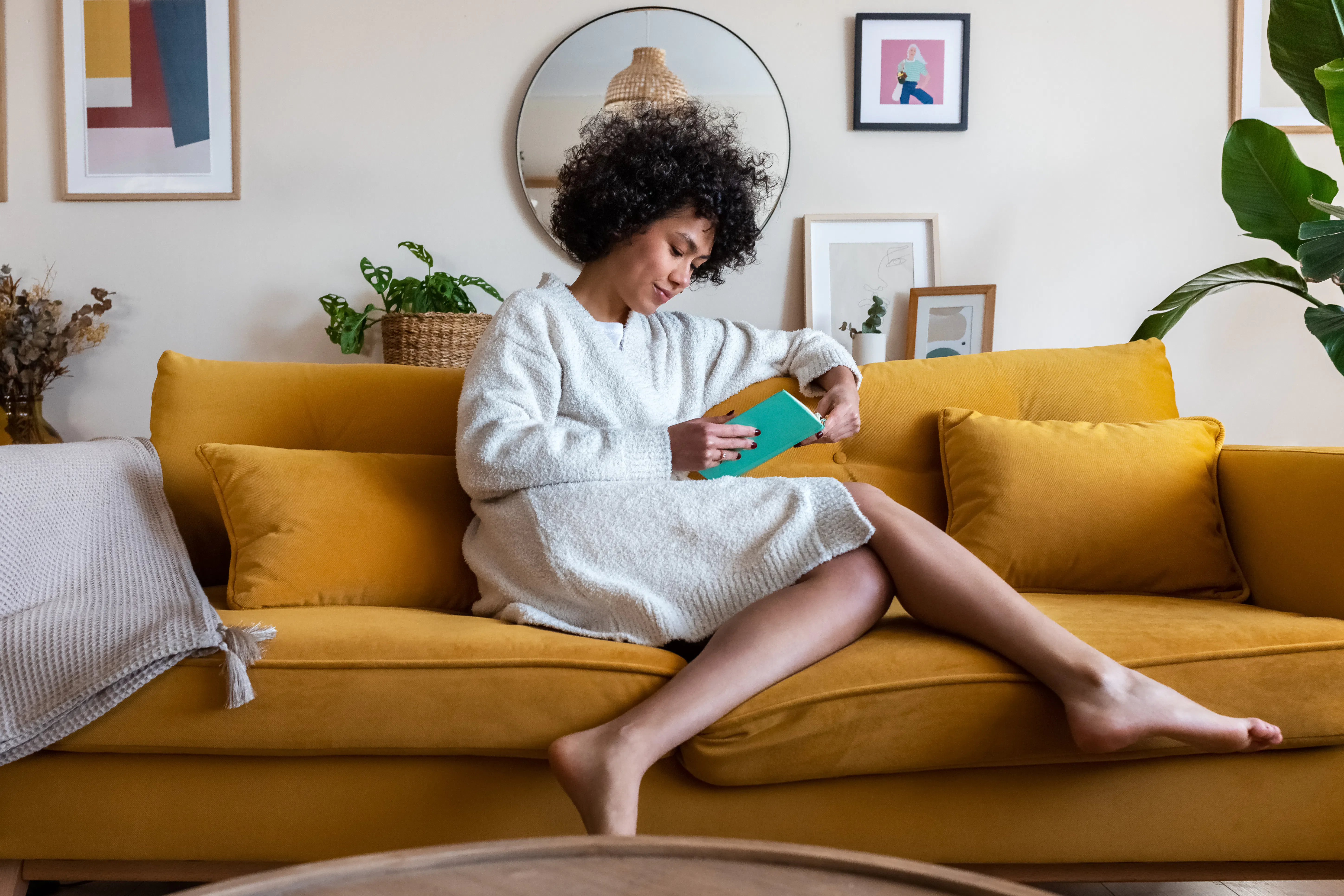 reading a book on the couch