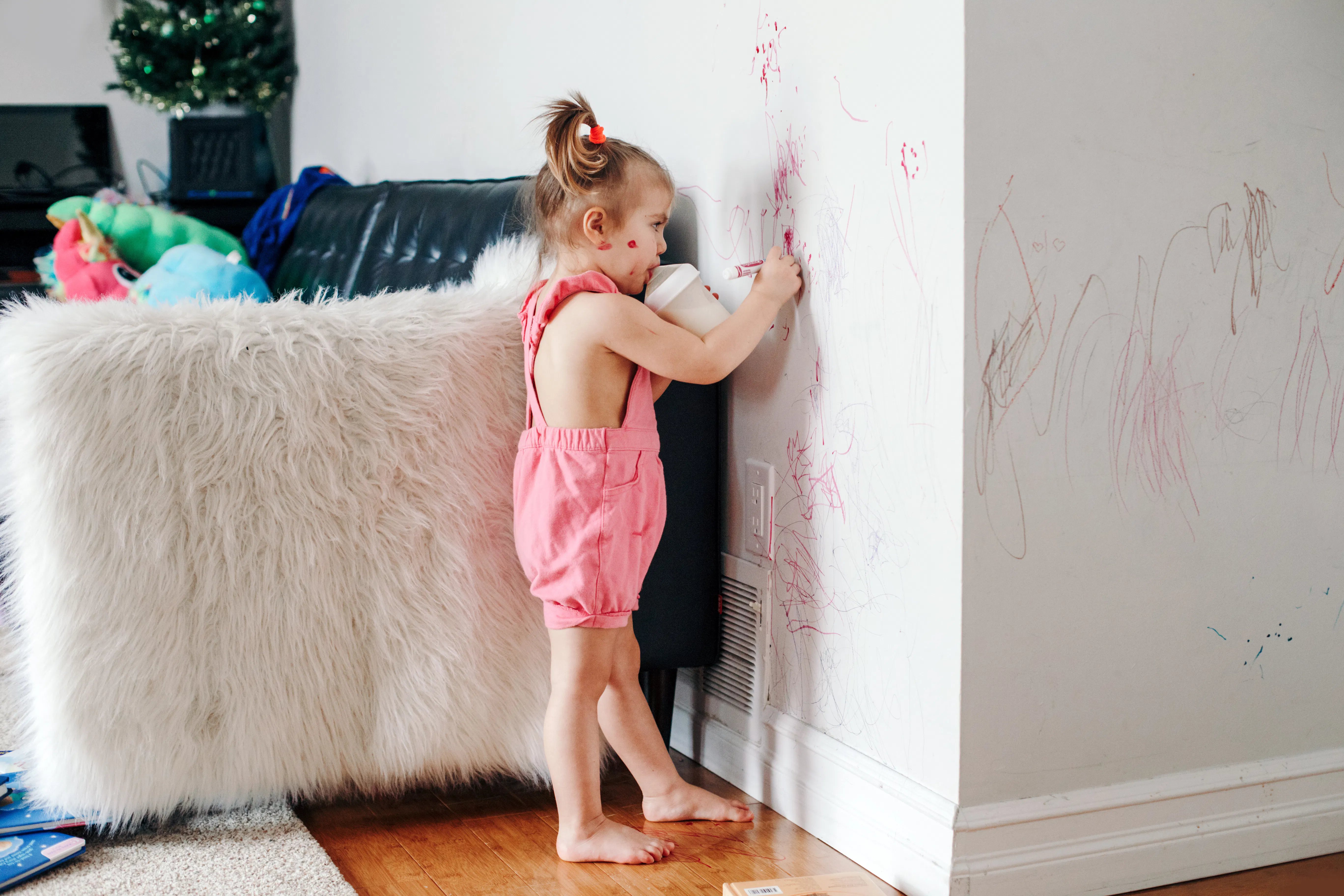 toddler drawing on wall