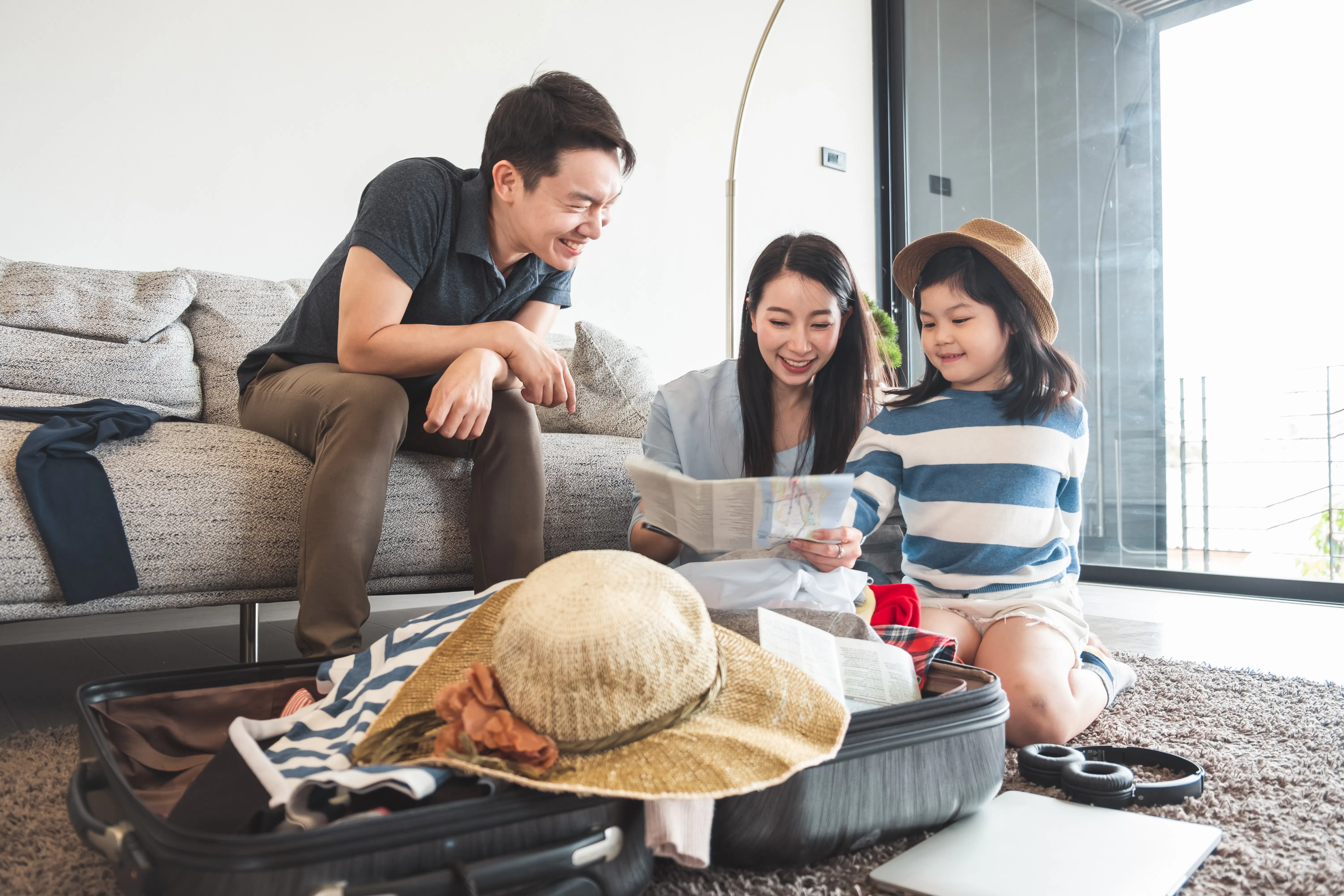 Family unpacking luggage