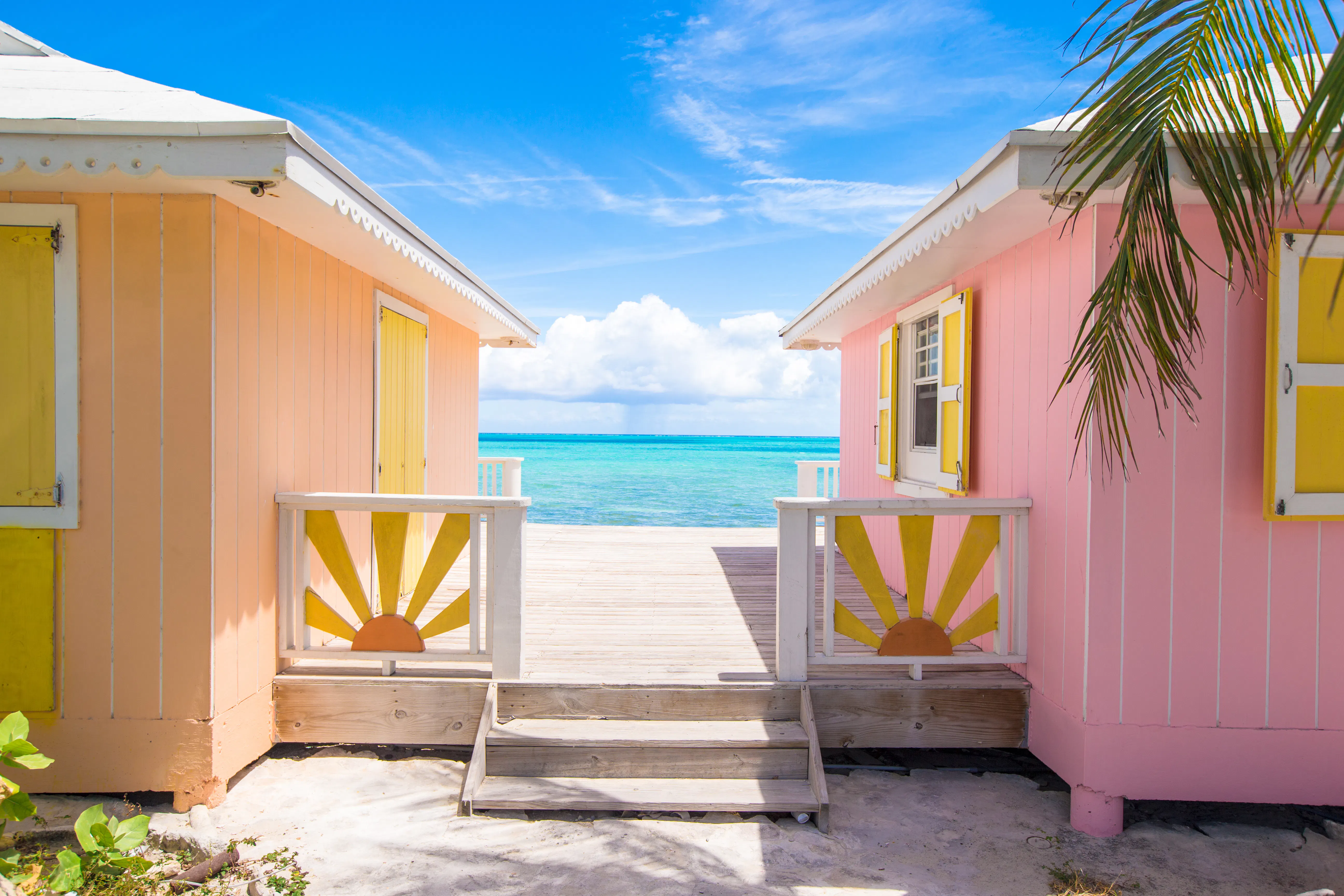 Bright neighboring houses on beach