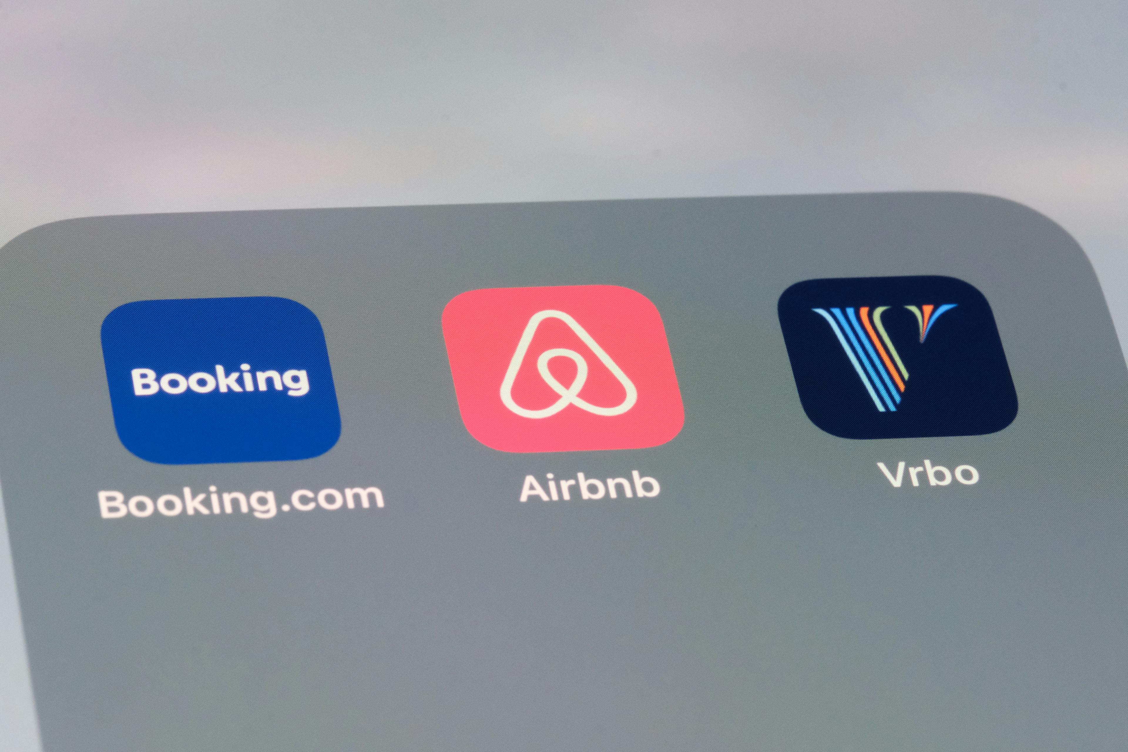 Airbnb, Booking.com and Vrbo app icons. Assorted online rental company brands