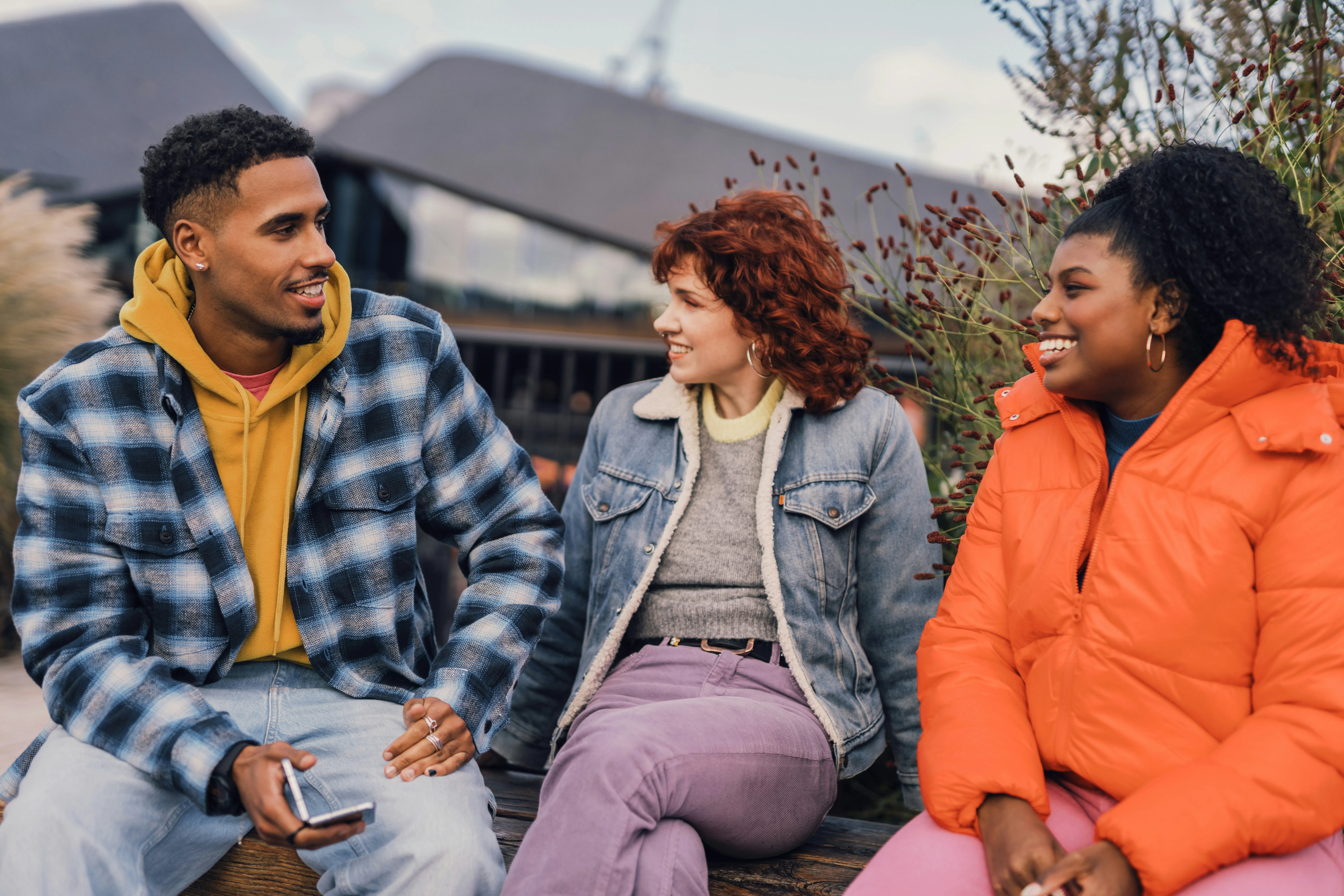 Three people talking
