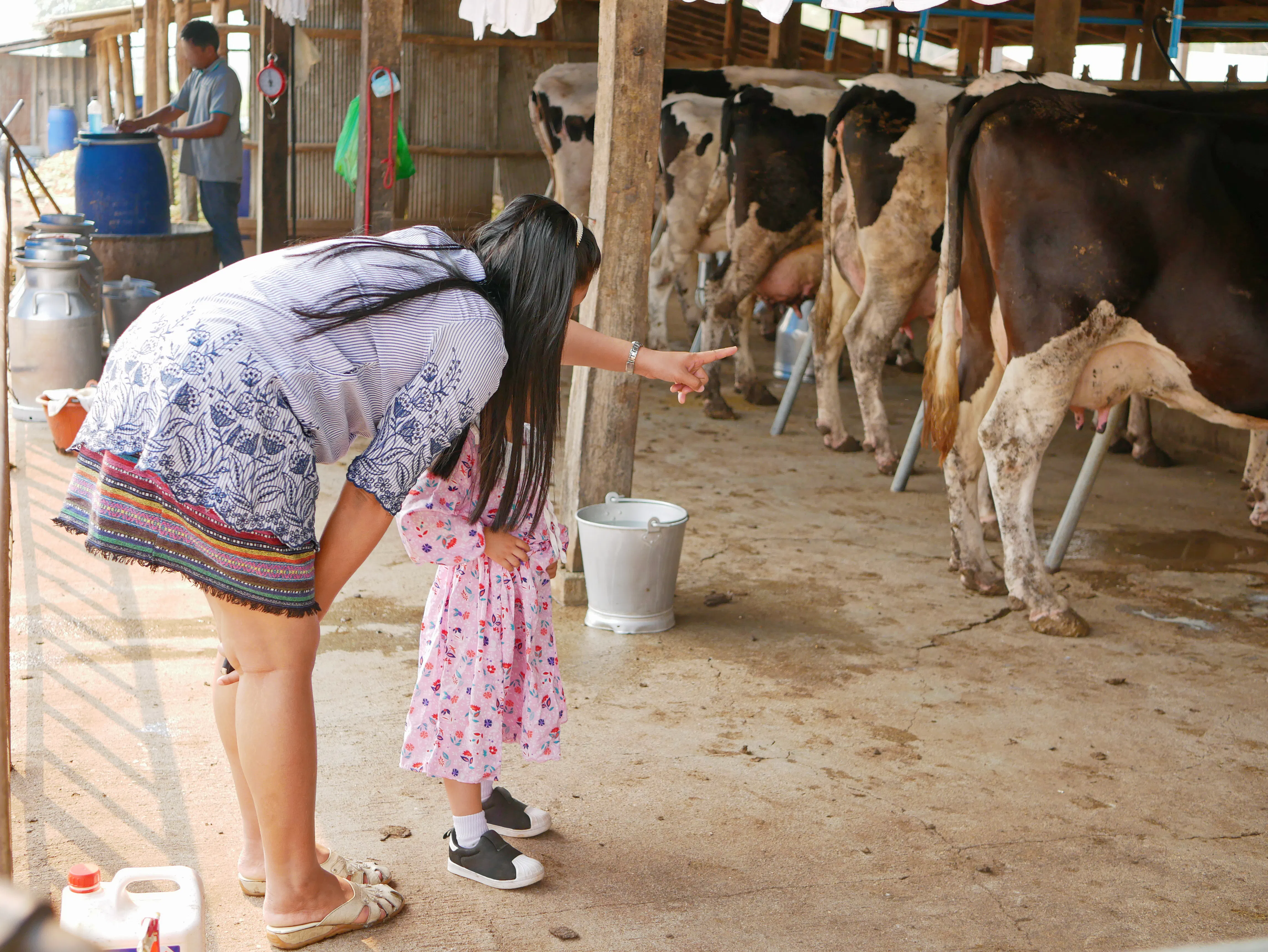 mother and child touring dairy farm