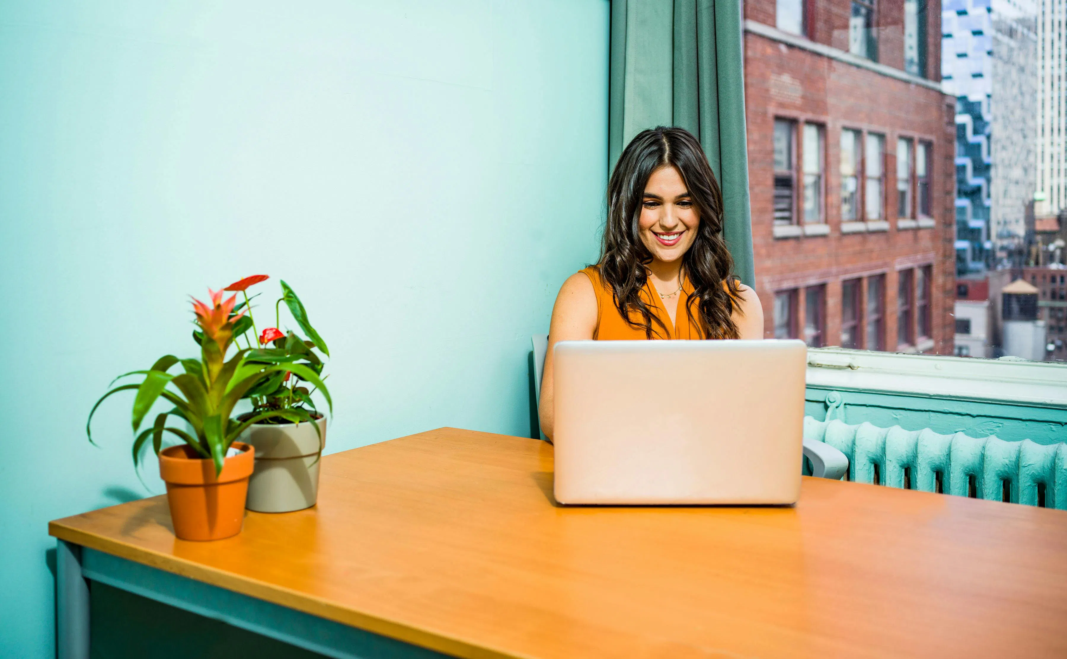 Woman on laptop at desk