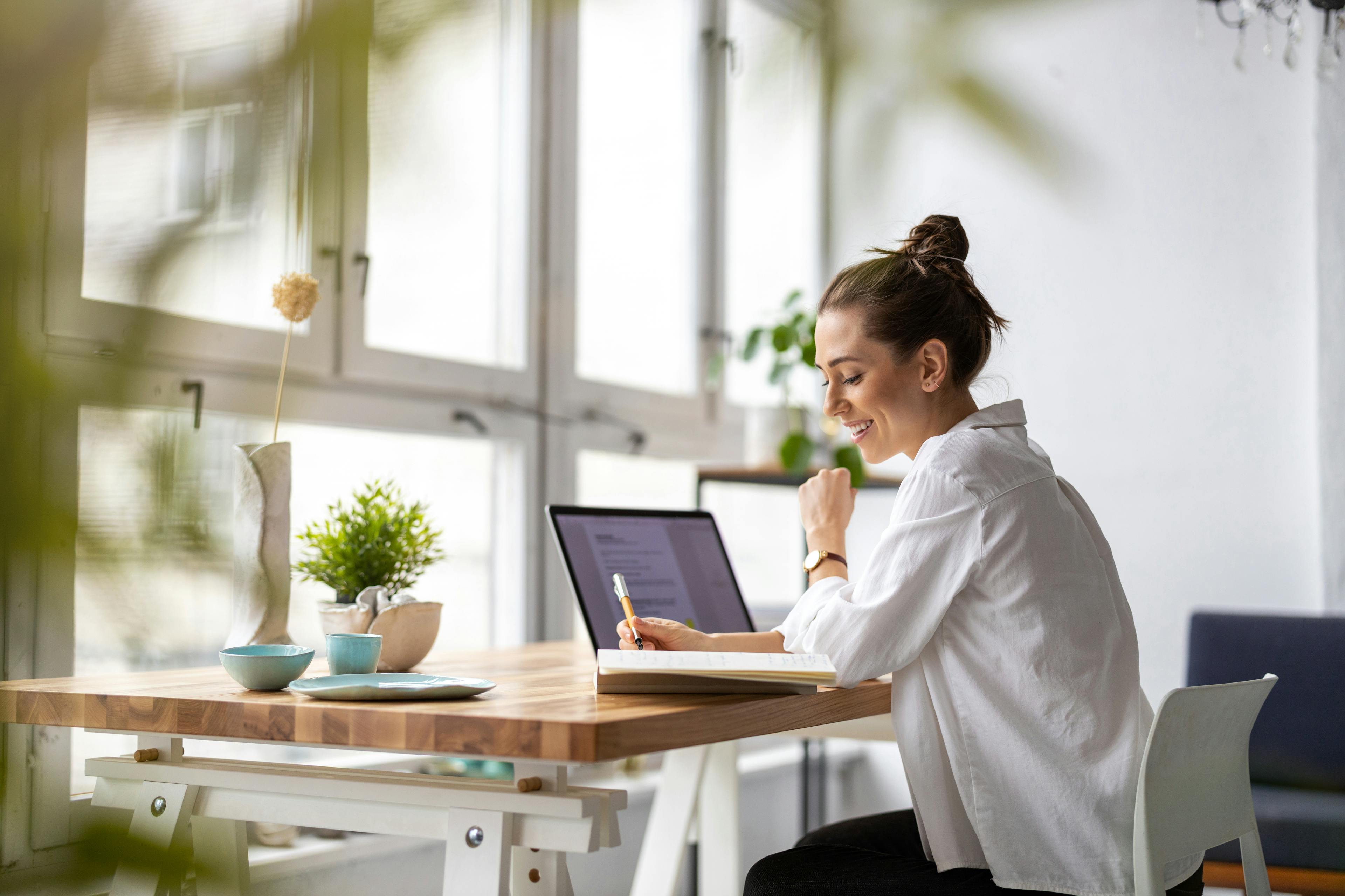 Woman smiling in home office