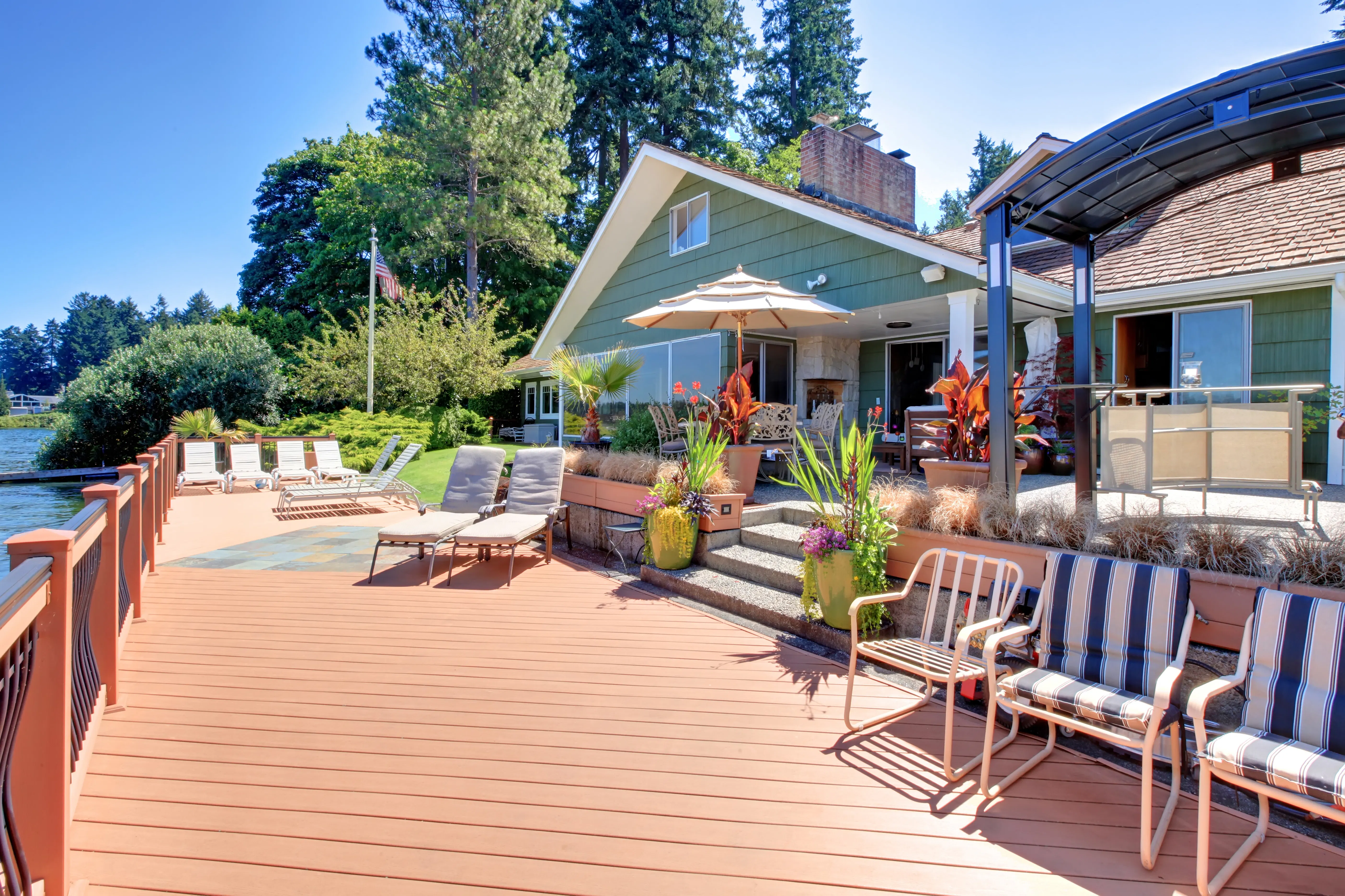 Lake house with large deck and outdoor living area