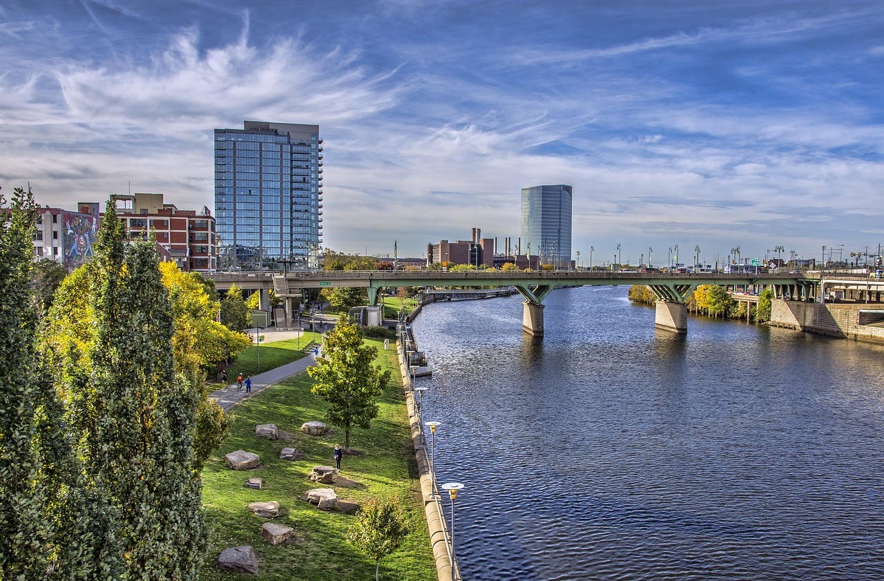 A scenic riverside view of the Philadelphia skyline