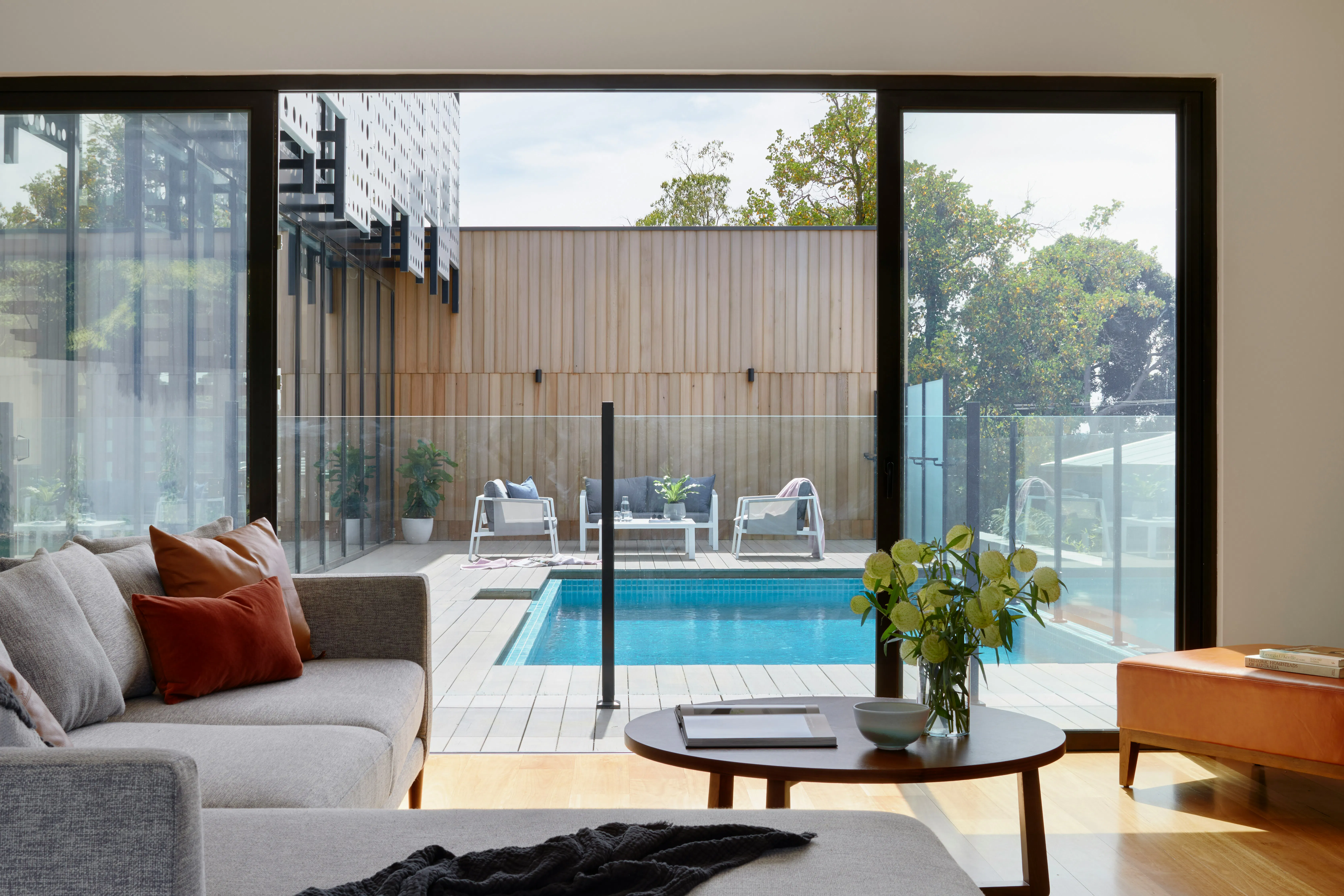 Living room with view of pool