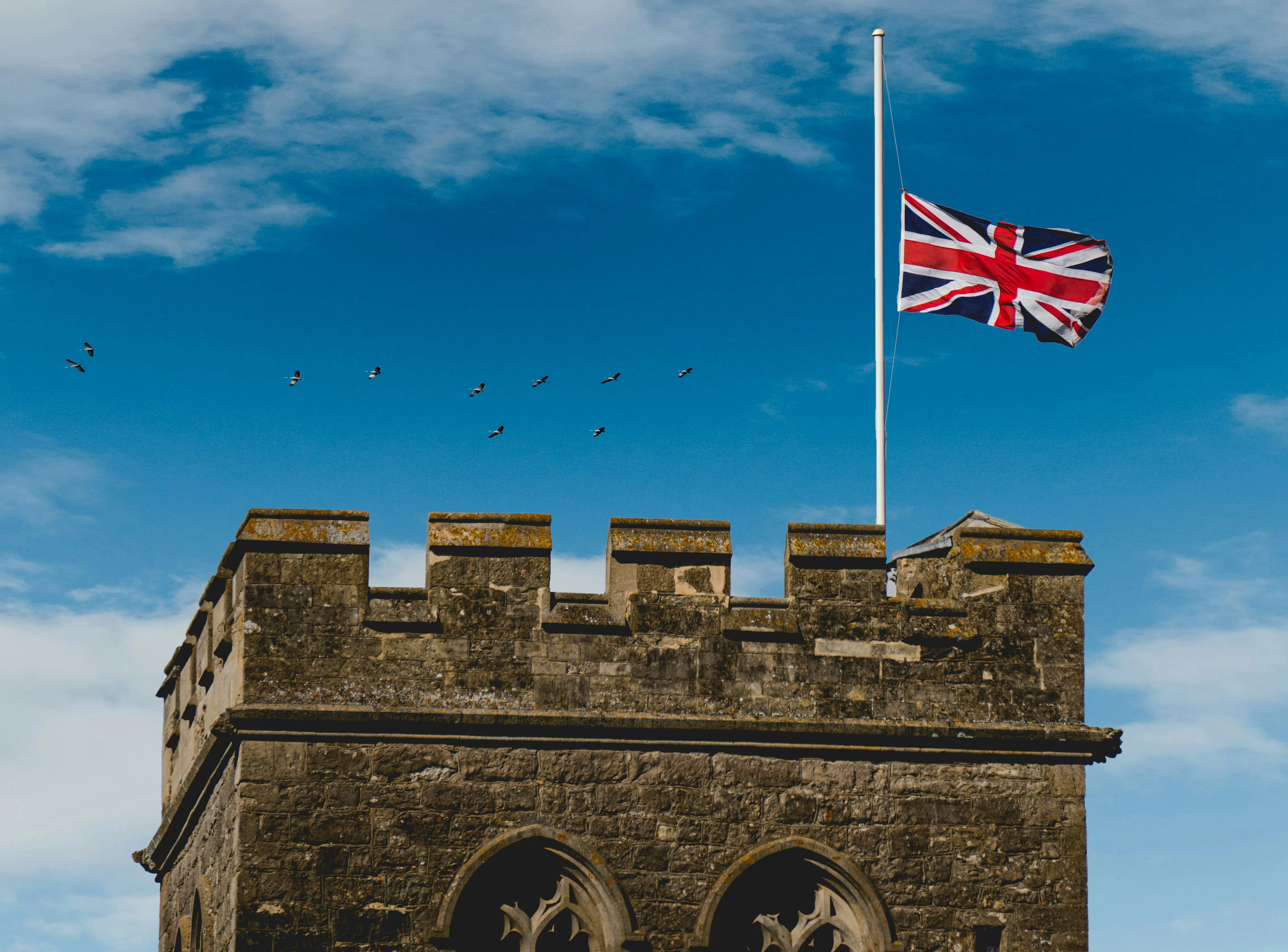 Stoke-on-Trent tower with Union Jack at half-mast