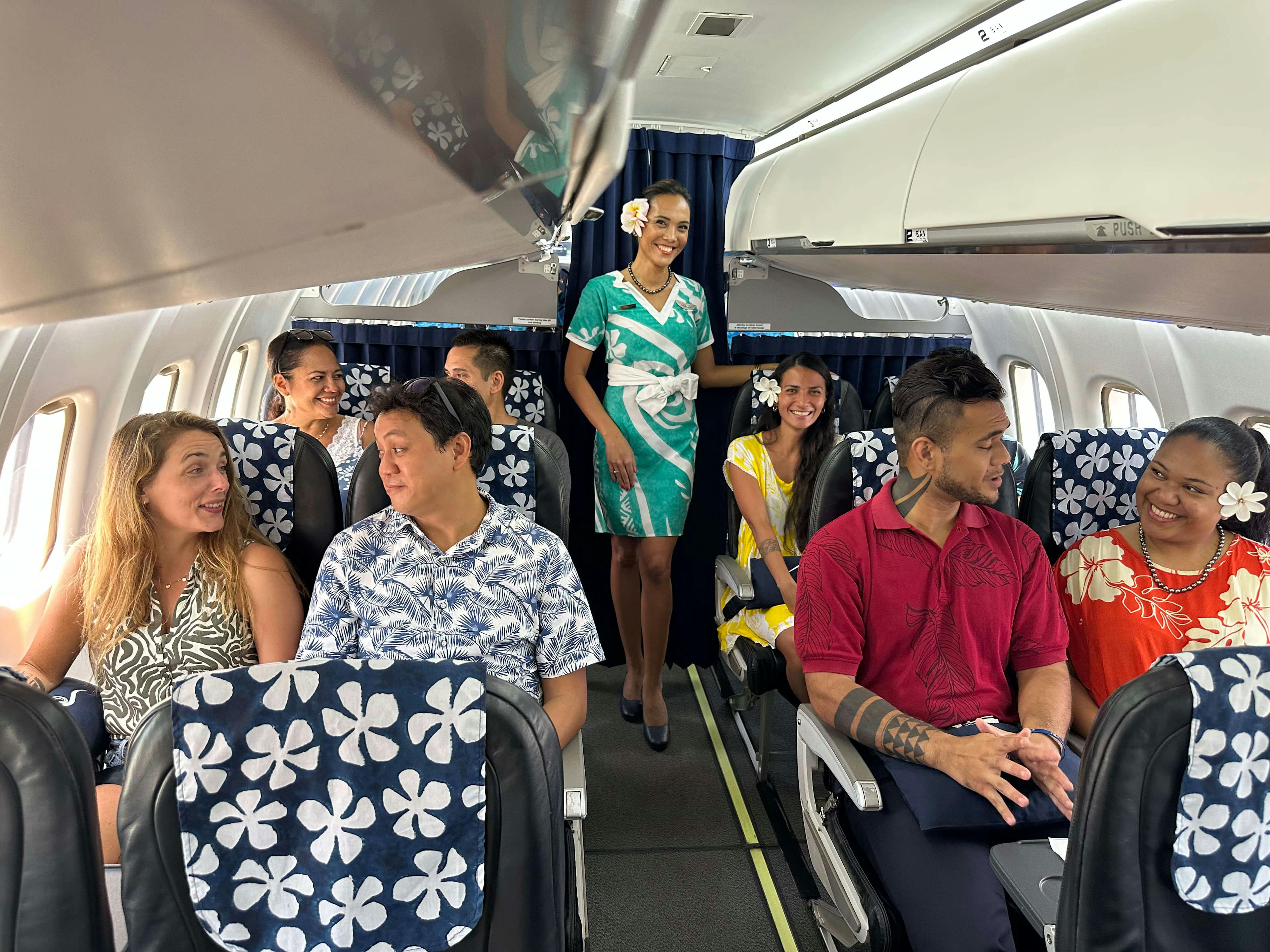 Passengers in the premium class on Air Moana flight