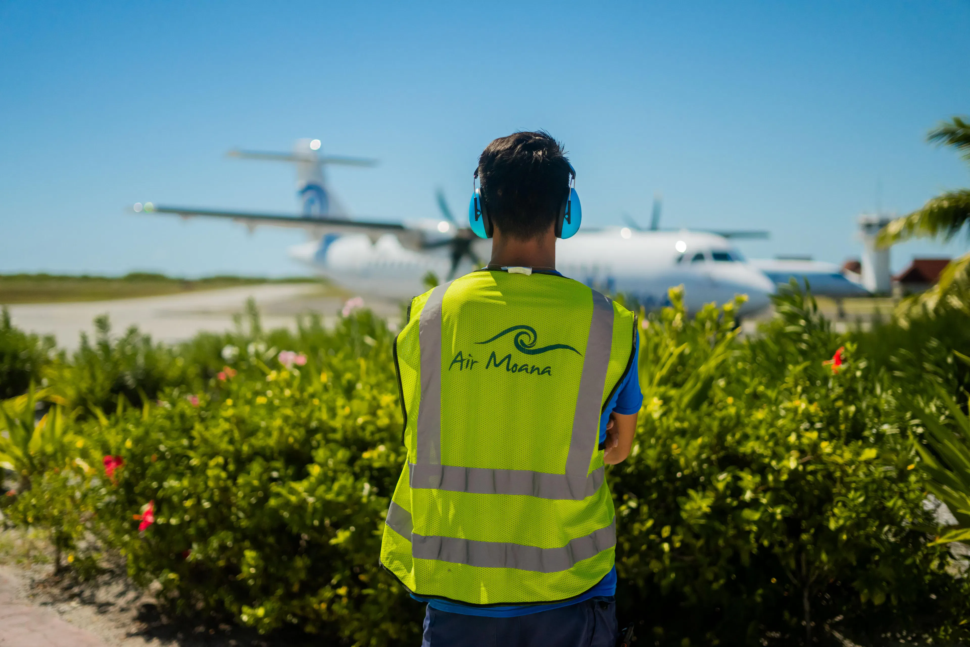 Air Moana employee look at the Air Moana Plane