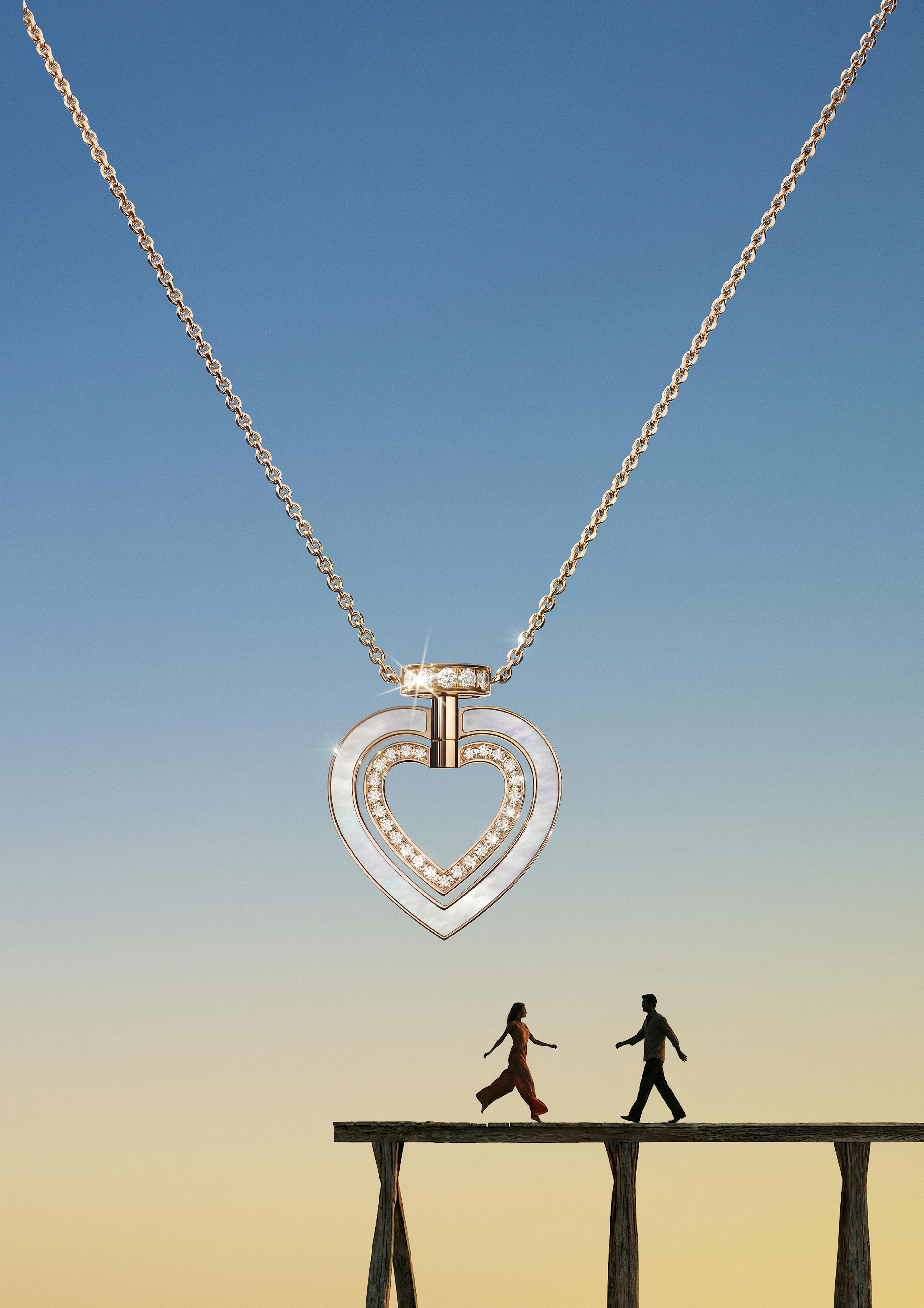 hearted necklace couple running