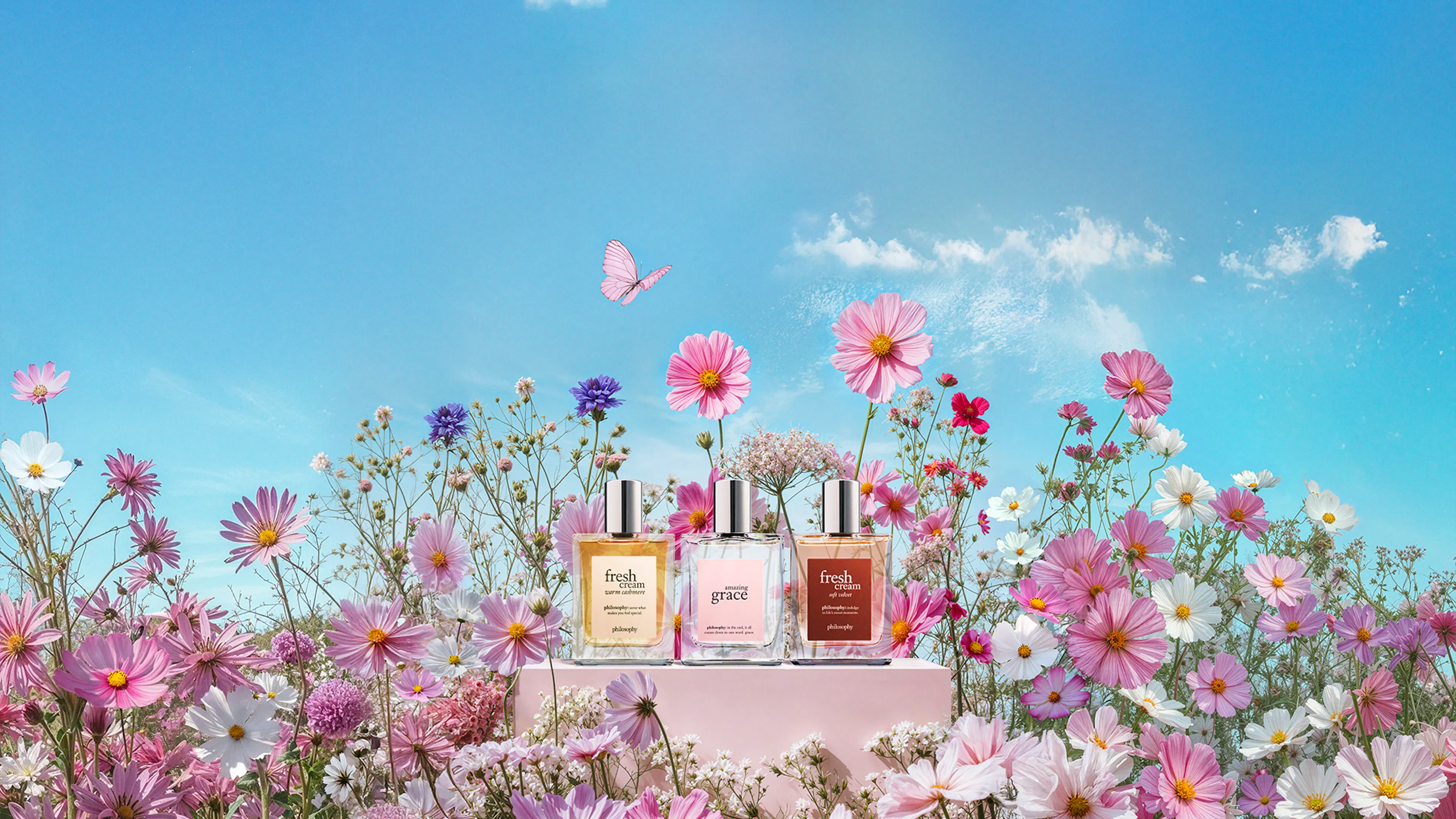 packshots of perfume with pink flowers