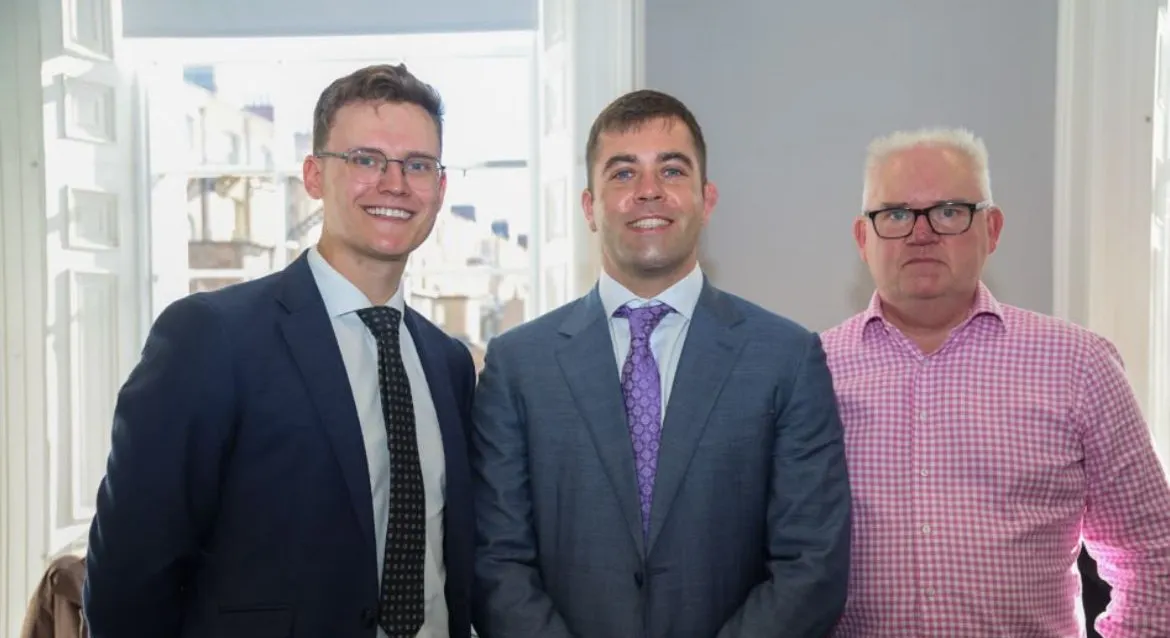 Albert Dolan TD and Damien Roche with a guest at the Irish Tax Hub office opening