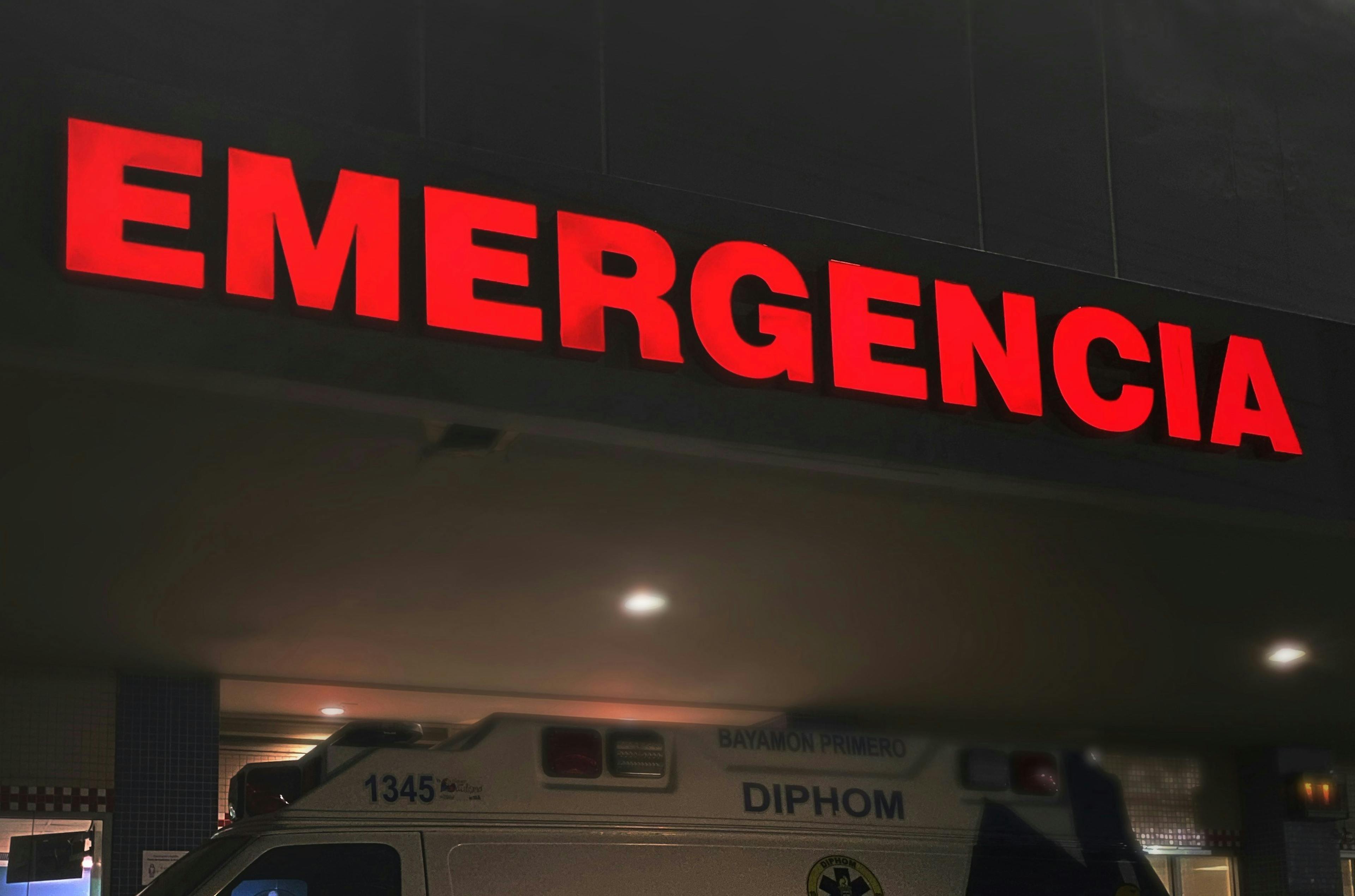 A picture of an ambulance outside of an emergency department