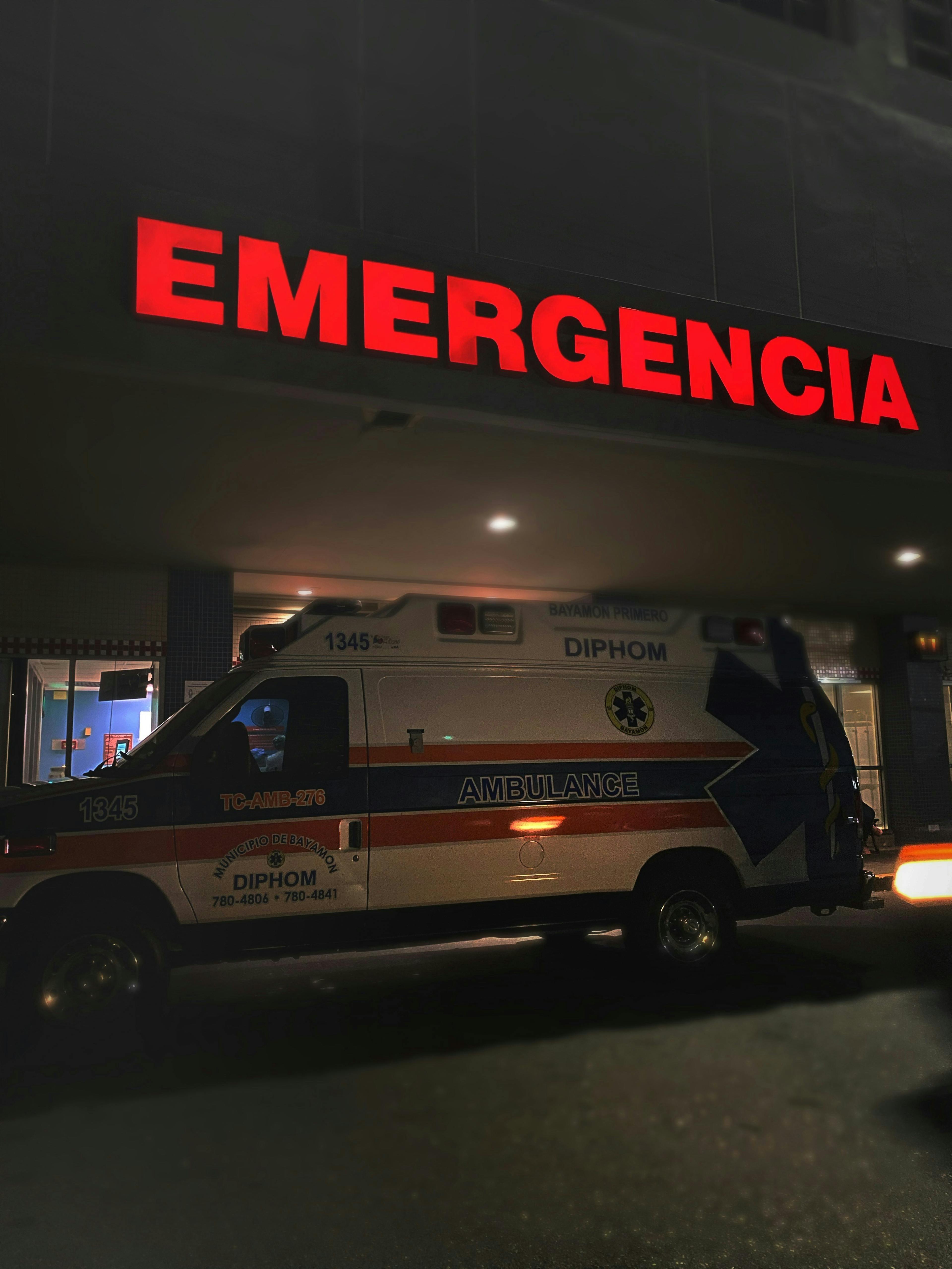 A picture of an ambulance outside of an emergency department