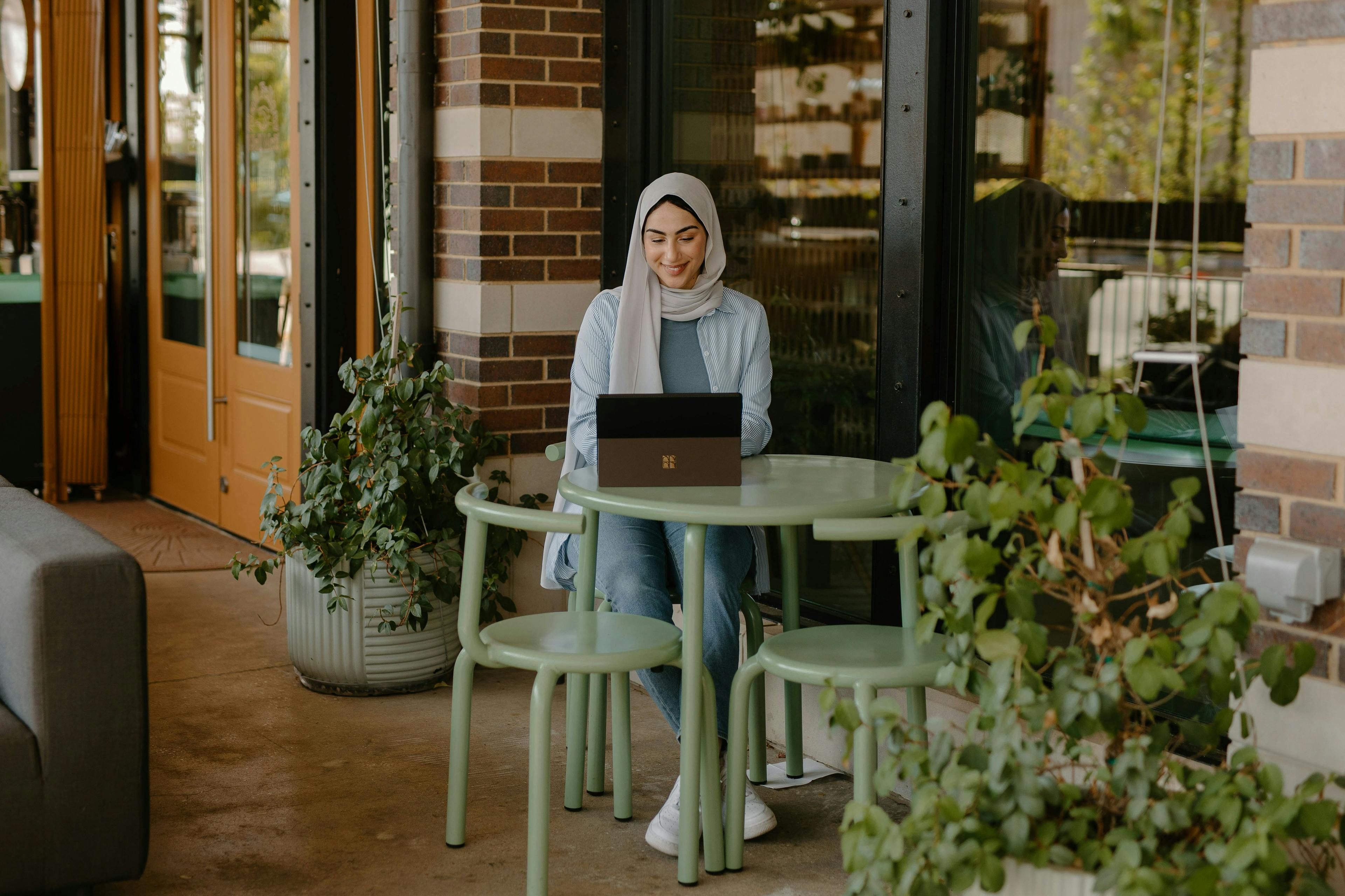A woman working on a laptop