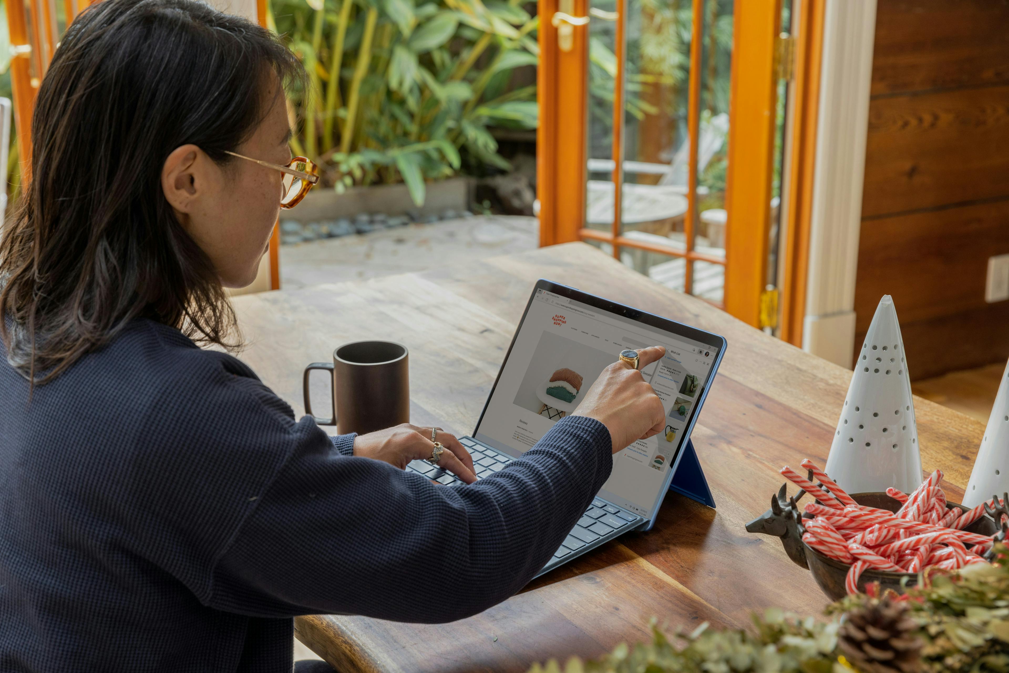A woman working on a laptop