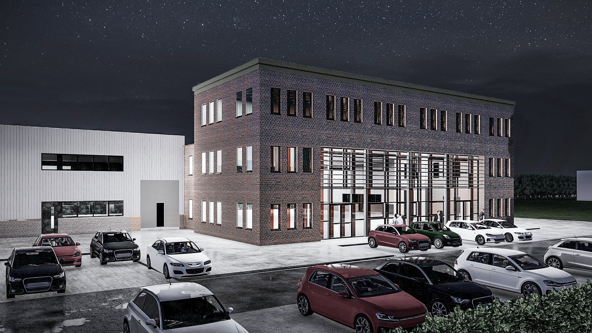 Parkplatz, Bürogebäude und Logistikhalle bei Nacht - Neubau eines Bürogebäudes mit Ausstellungsbereich und Logistikhalle in Heinsberg.