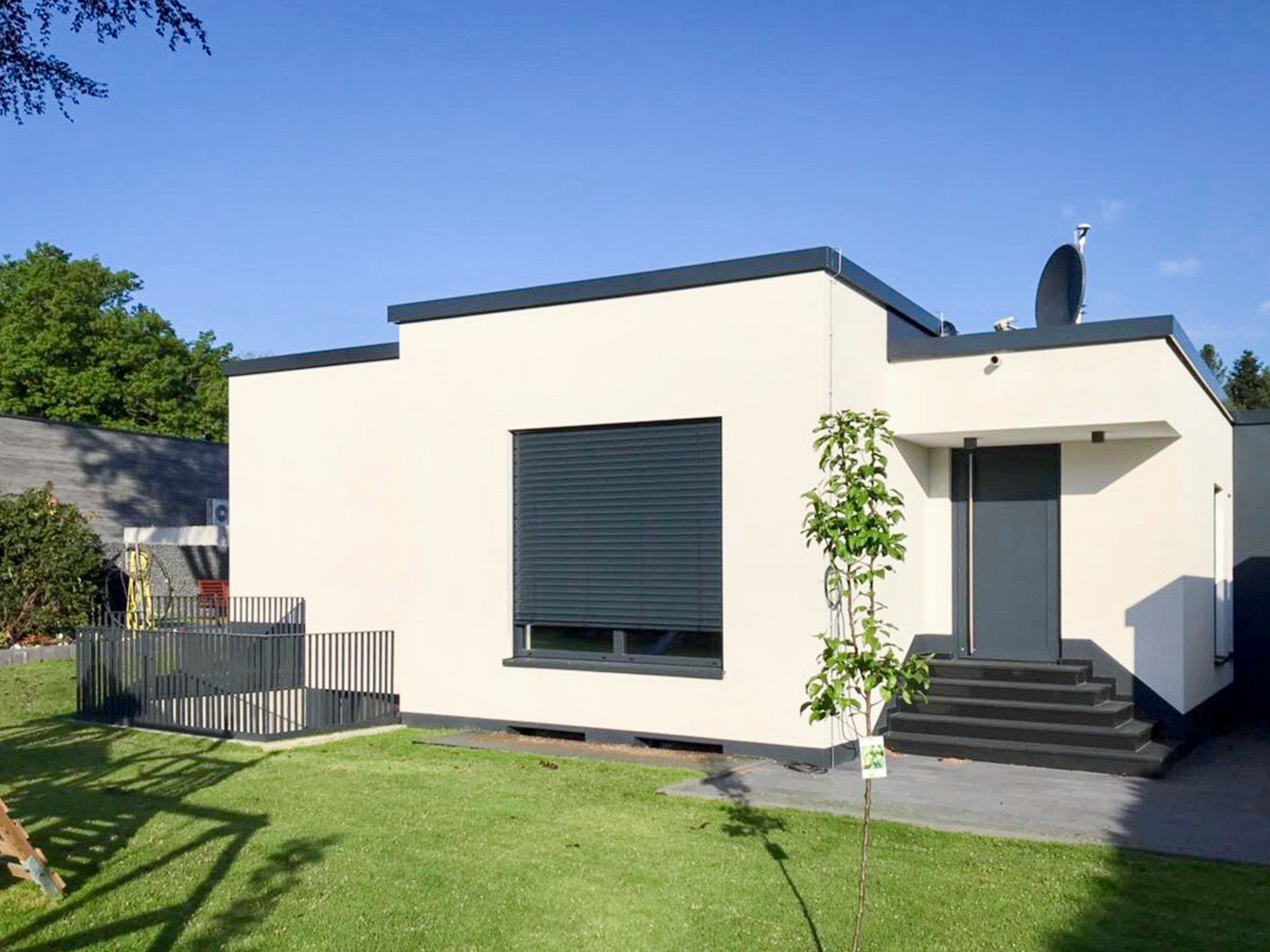 Ansicht vom Garten - Umbau eines Einfamilienhauses in Bottrop.
