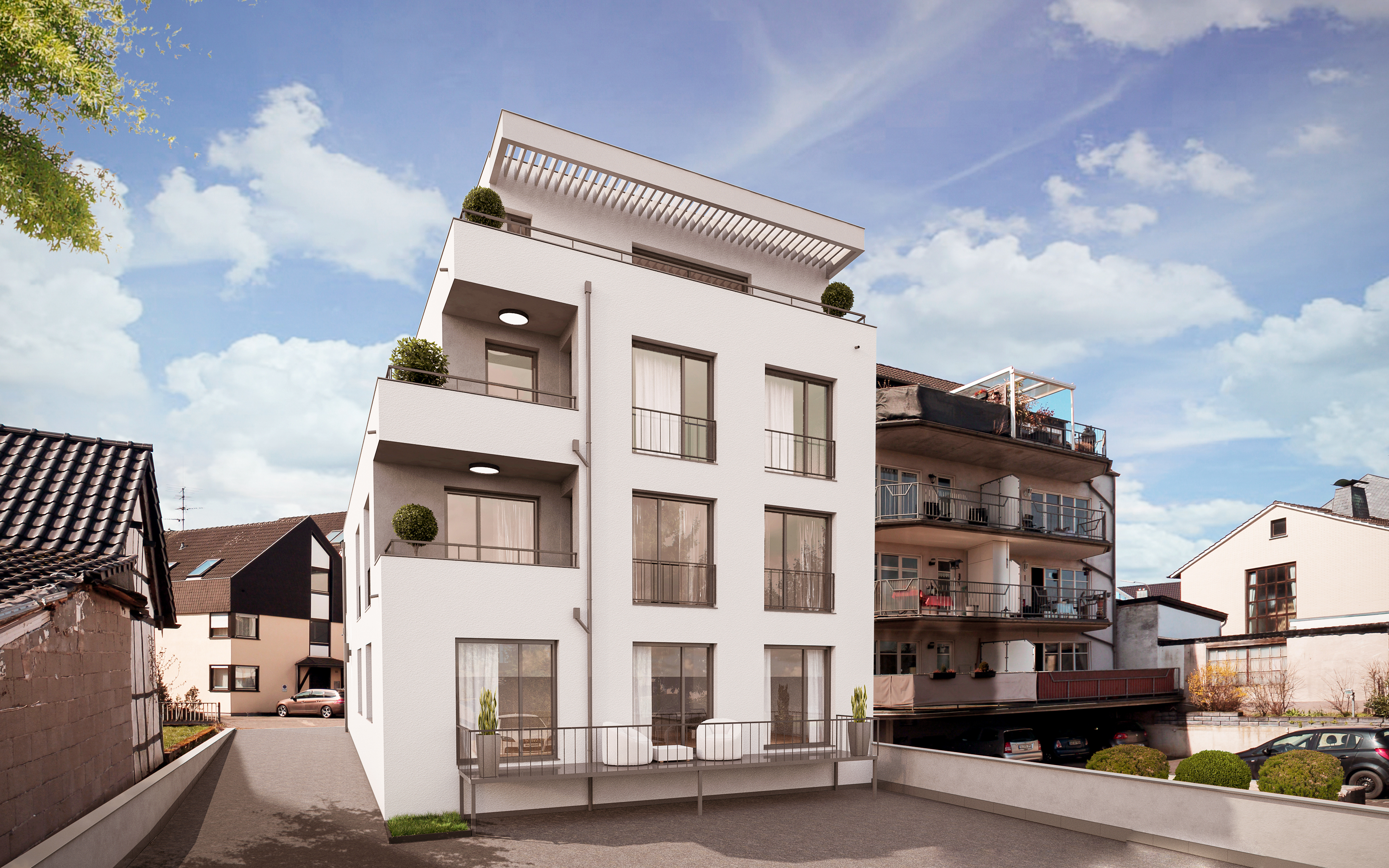 Die rückseitige Ansicht - Neubau eines Mehrfamilienhauses in der Hofgartenstraße in Troisdorf.