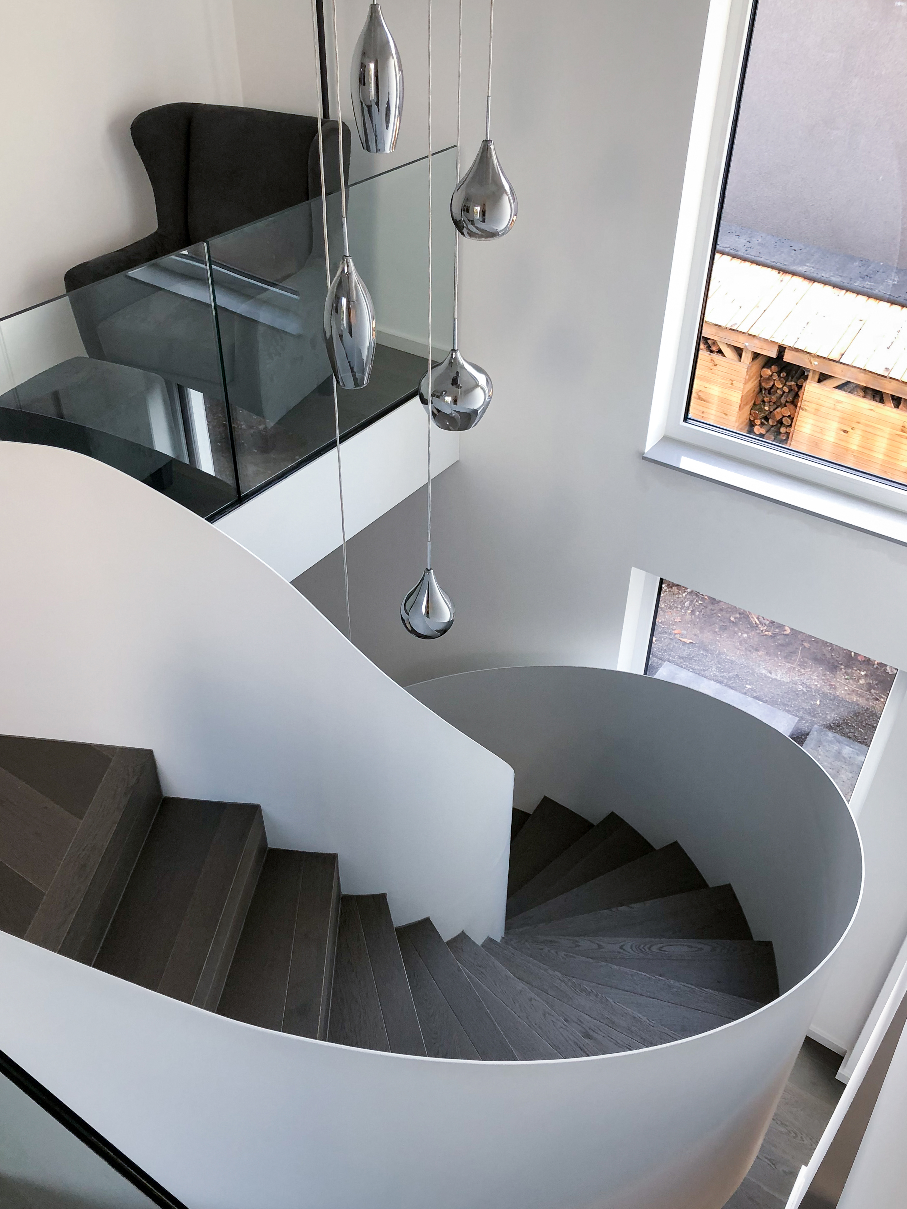 Die freistehende Wendeltreppe - Neubau eines Einfamilienhauses mit Einliegerwohnung in Köln-Dellbrück.