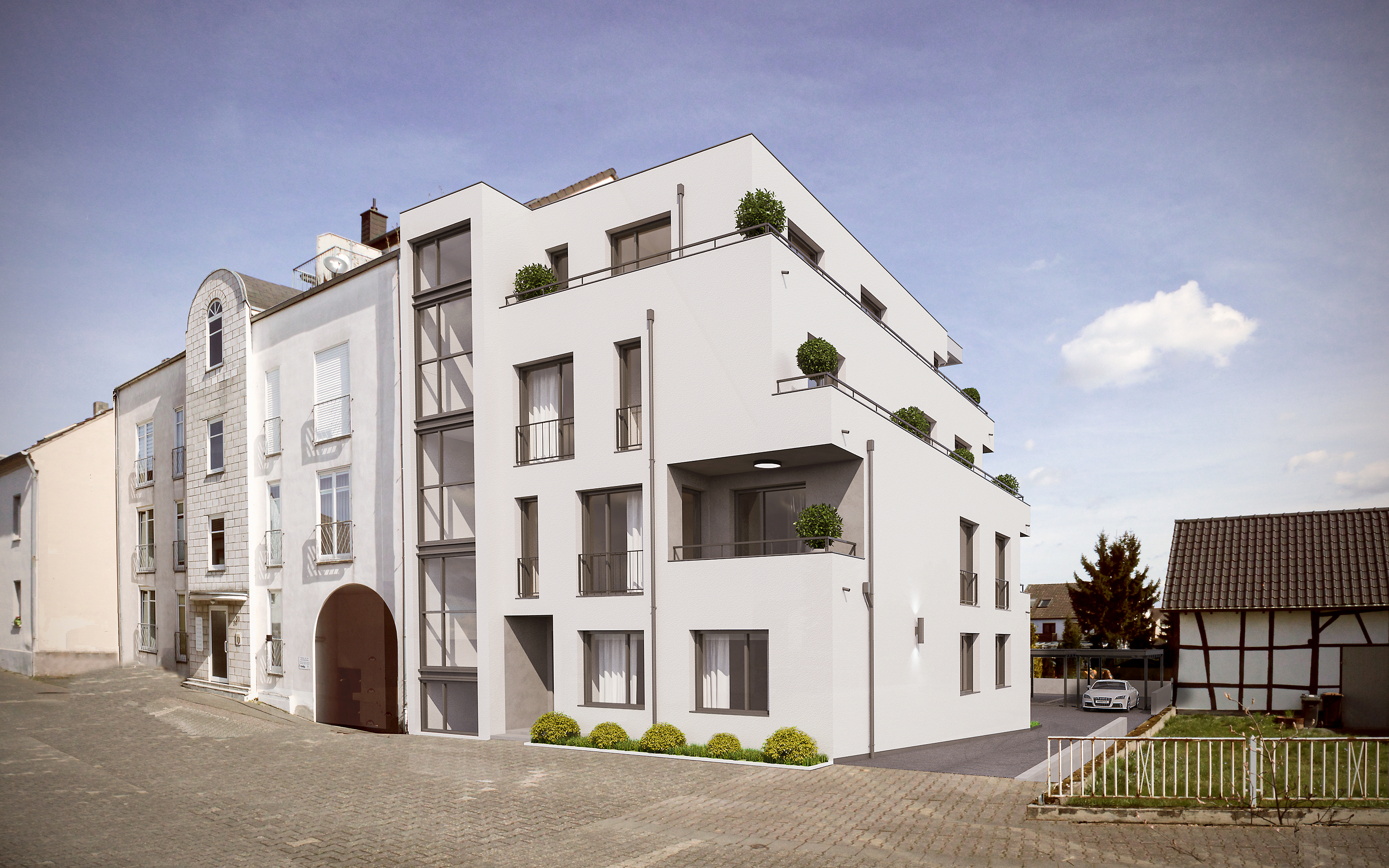 Die Fassade zur Straße - Neubau eines Mehrfamilienhauses in der Hofgartenstraße in Troisdorf.