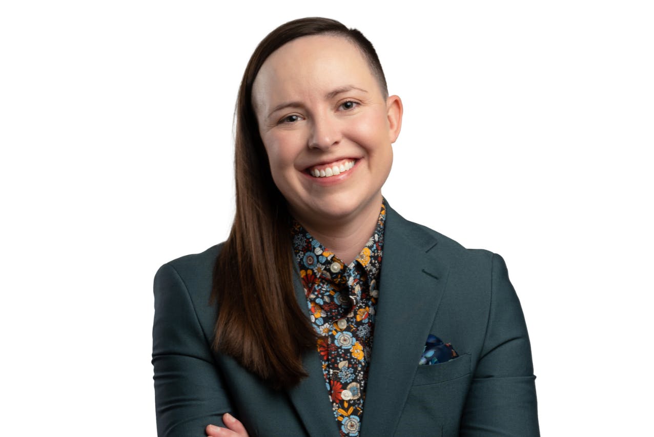 A headshot of Kate Woloshyn