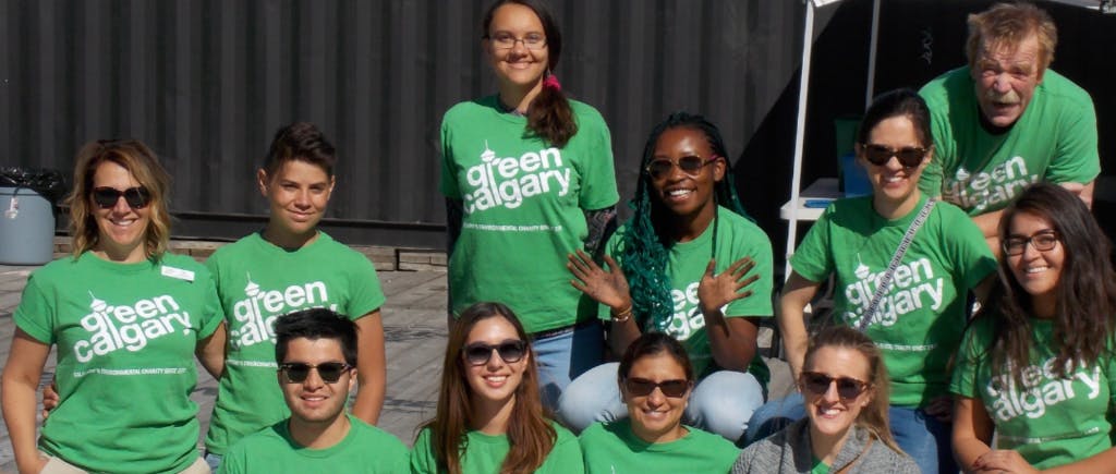 Group of people in Green Calgary t-shirts