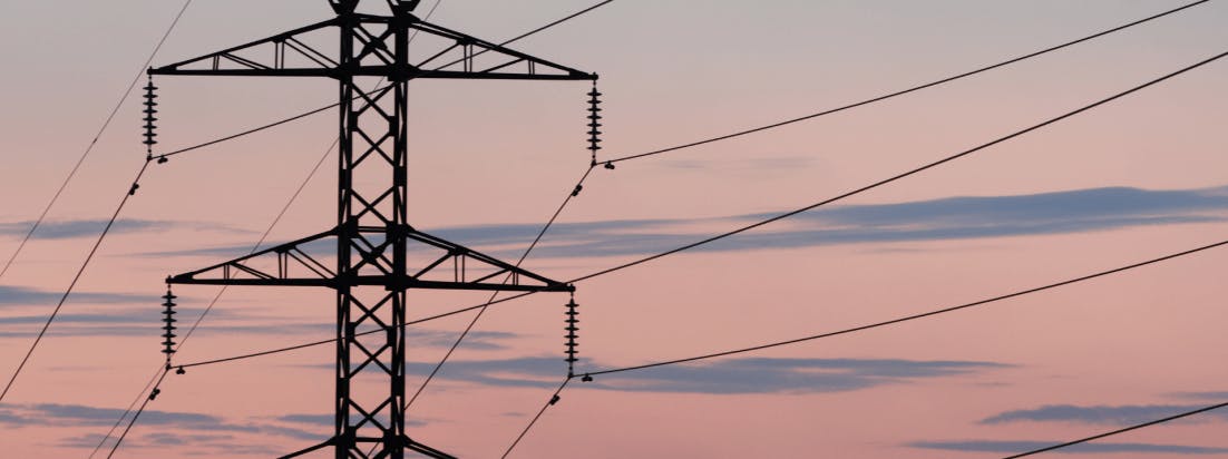 Power lines against a morning sky.