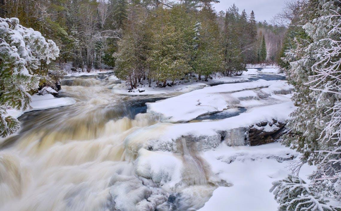 Flowing rivers in a winter scene at Egan Chutes