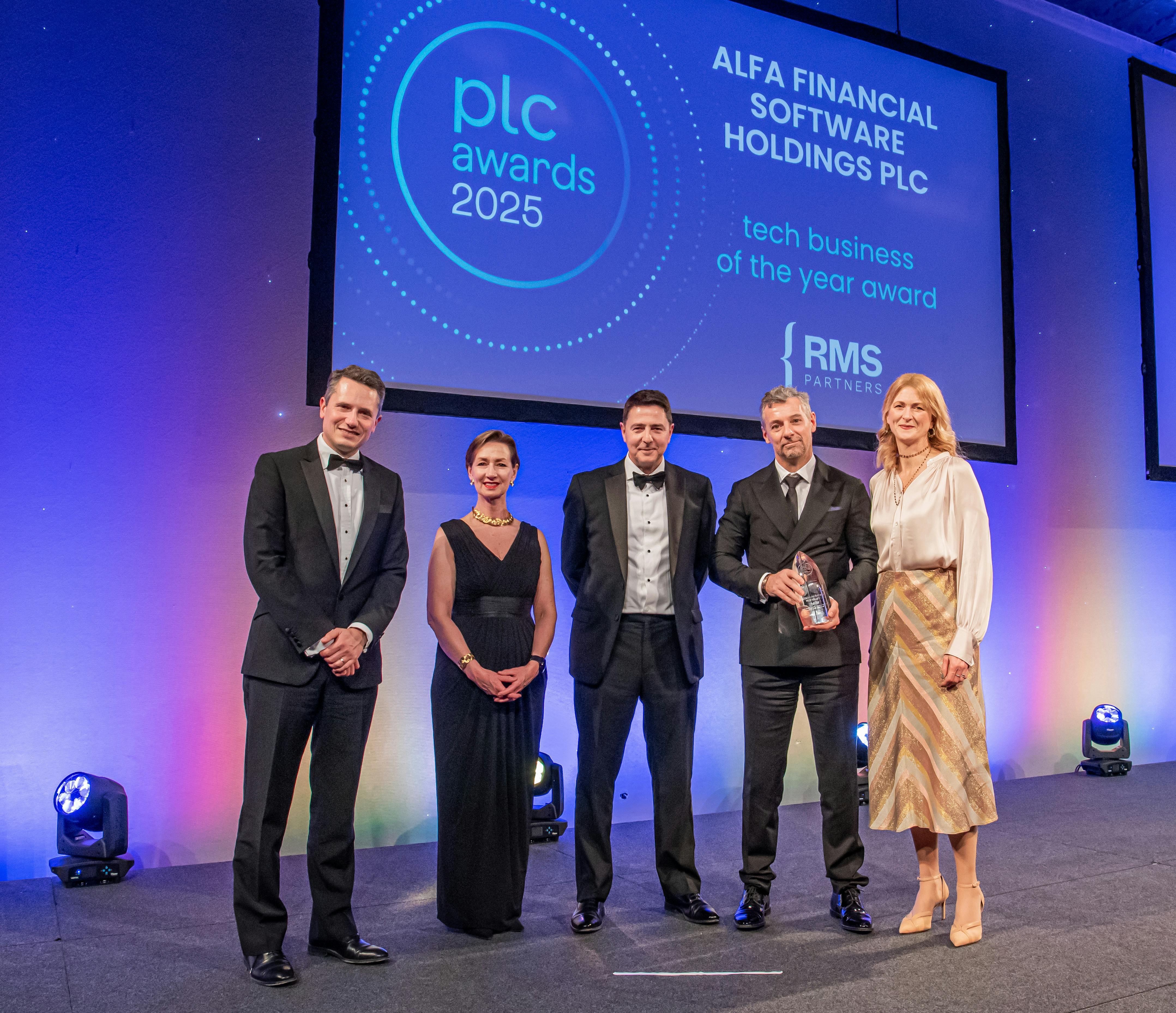 Group collecting plc award 2025 on stage.